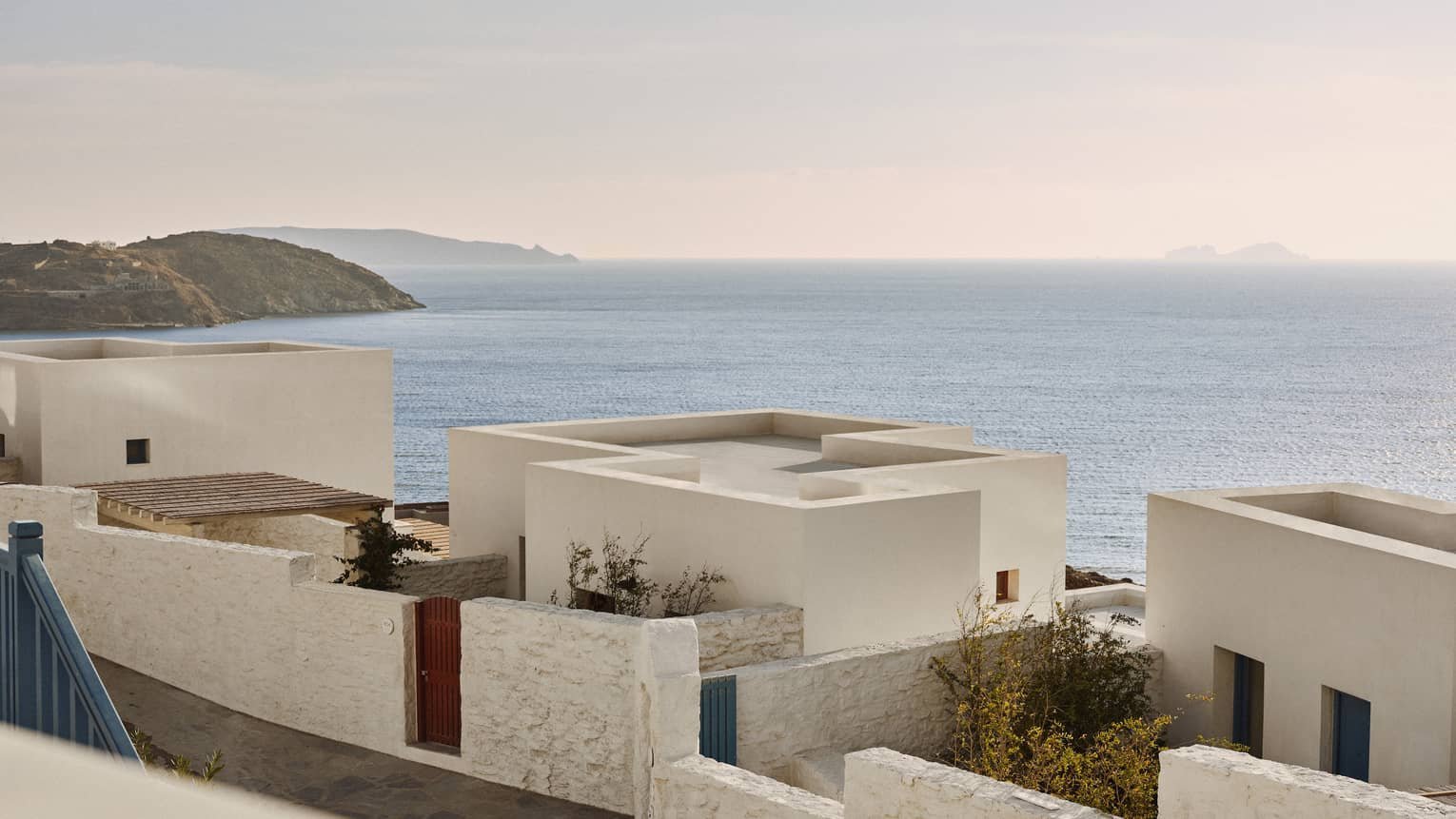 Whitewashed Cycladic architecture and Aegean views at Four Seasons Hotel Mykonos