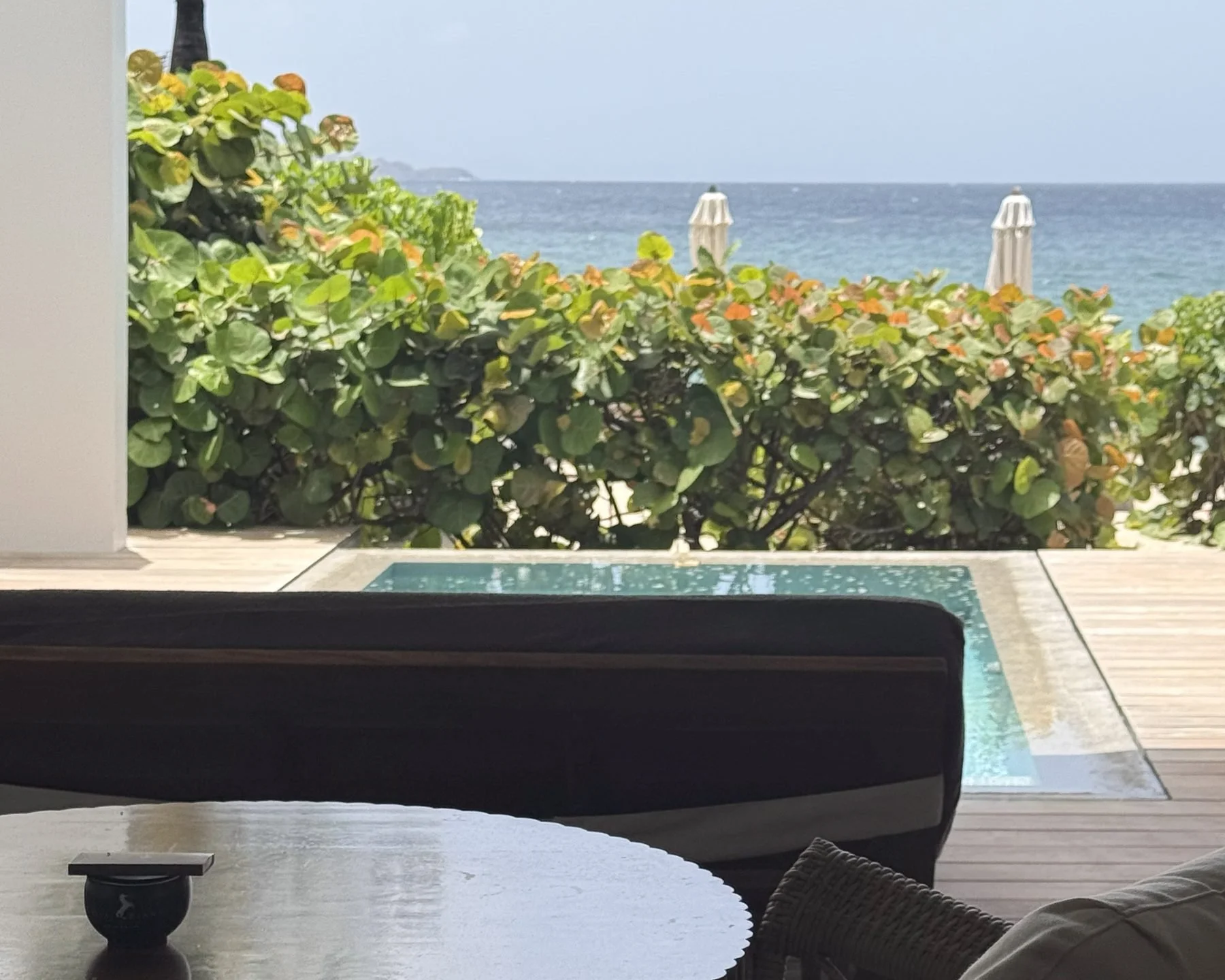 Private plunge pool and sea view from a suite terrace at Cheval Blanc St-Barth