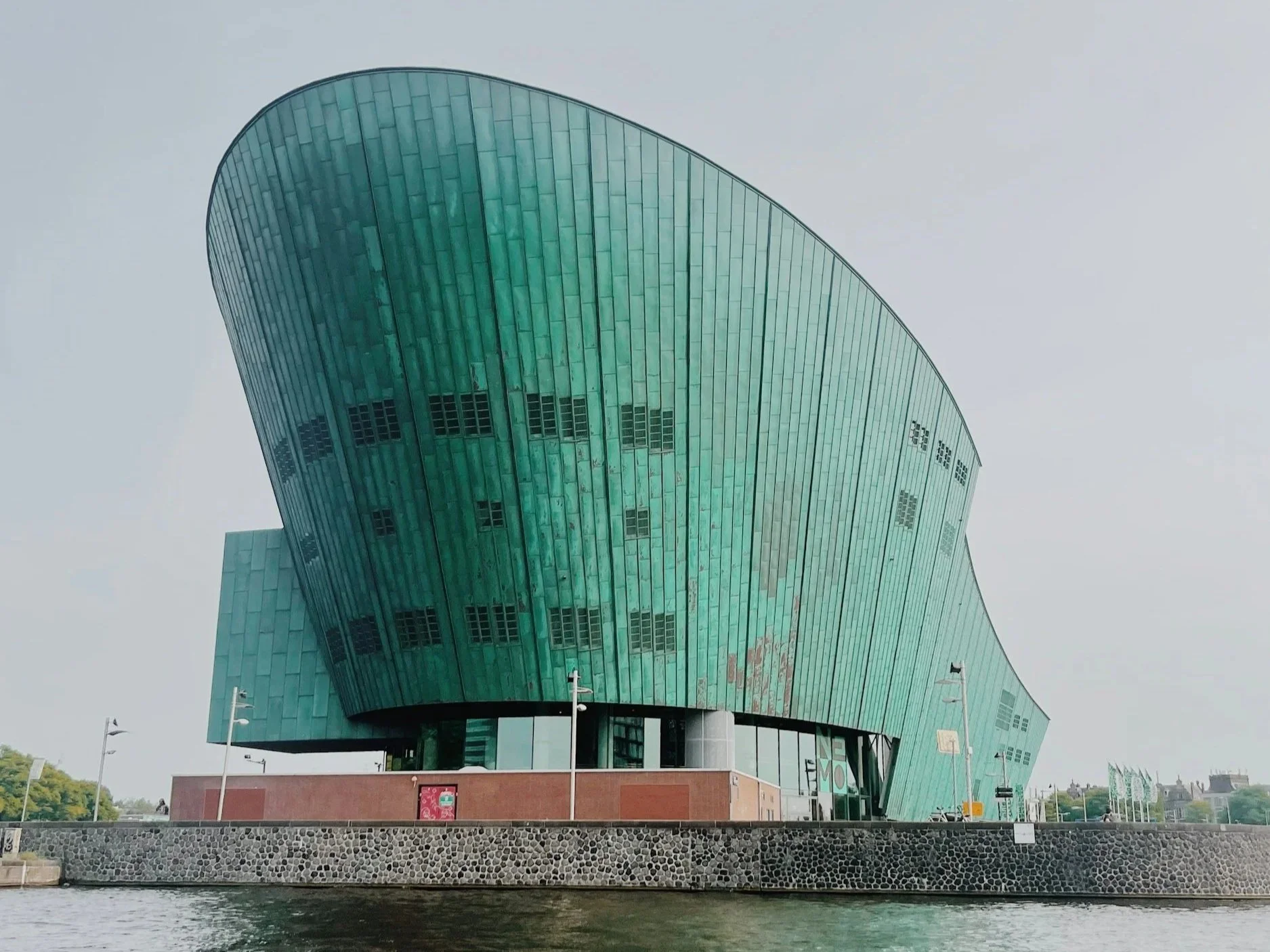 The green ship-shaped NEMO Science Museum building in Amsterdam's Oosterdok