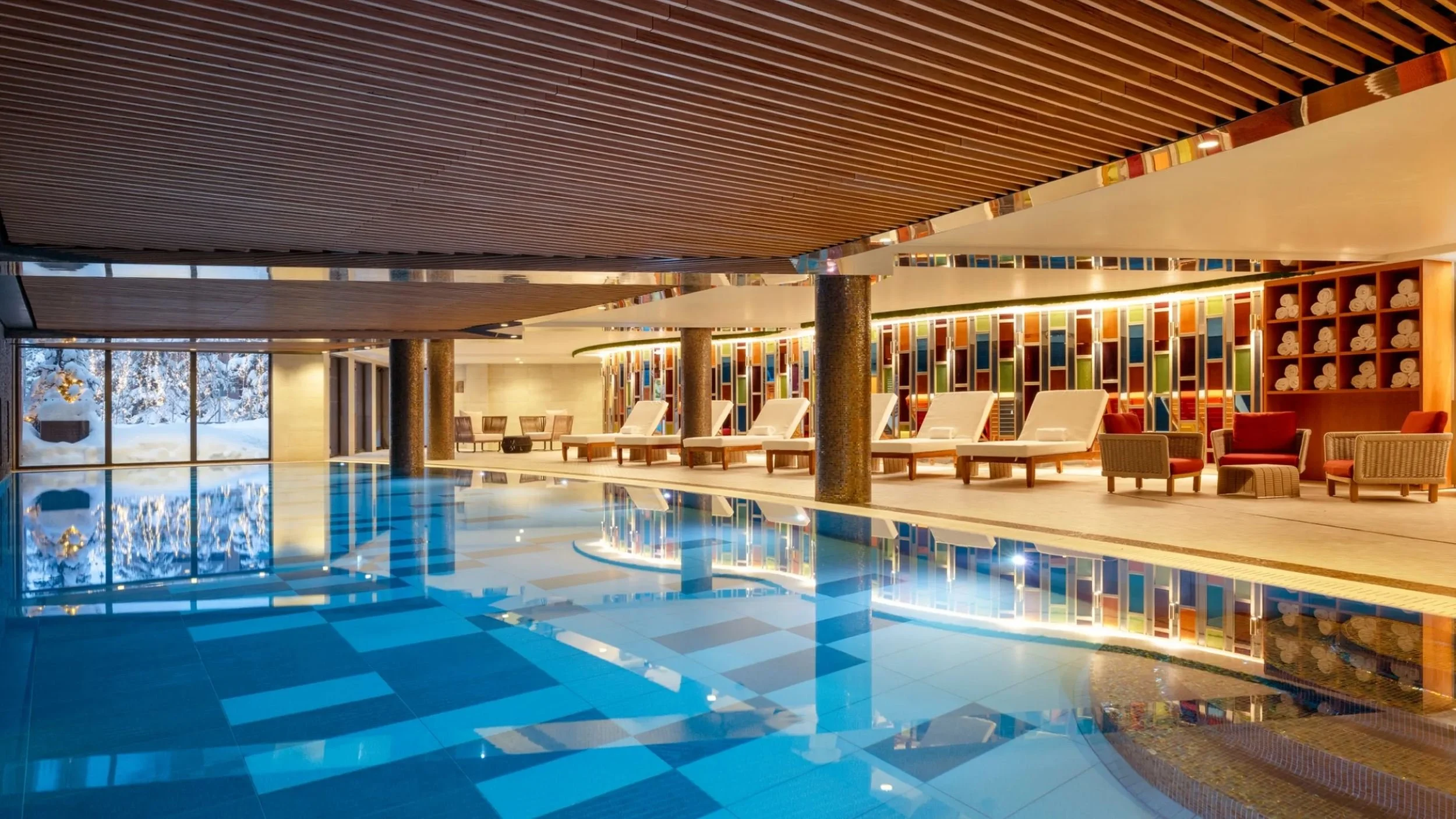 Indoor pool at the Guerlain spa at Cheval Blanc Courchevel facing the slopes