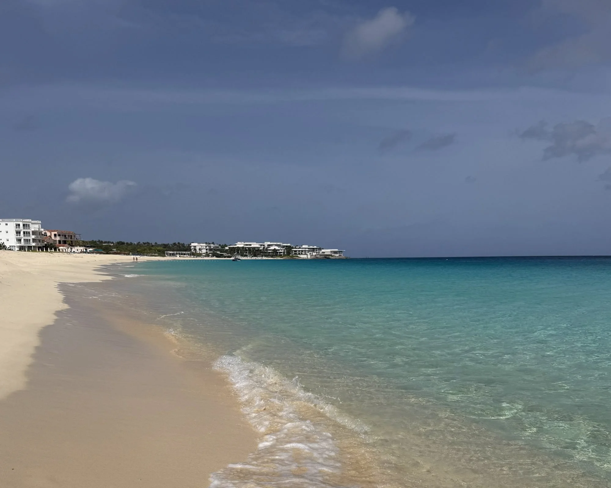 Clear turquoise water and white sand along Meads Bay beach at Four Seasons Anguilla