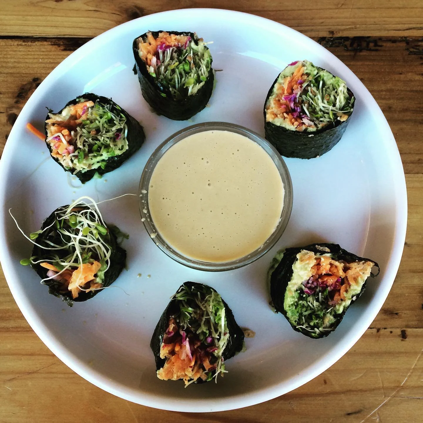 Inspo: Nori Roll with avocado, purple cabbage, carrots, and sprouts with Miso-tahini dressing