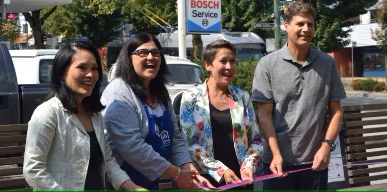   From left to right, Jenny Kwan, Jocelyne Hamel (Mount Pleasant Neighbourhood House), Melanie Mark, and Ian Stewart (Viva Vancouver) cut the ribbon on the opening day of the new parklet. (Mount Pleasant Neighbourhood House)  