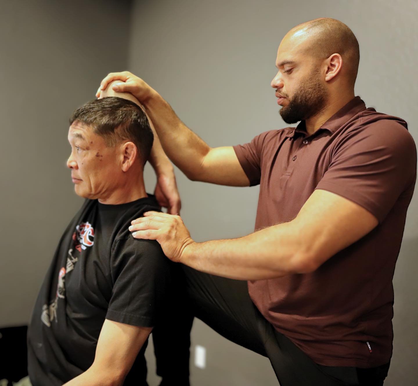An assisted neck and shoulder stretch
