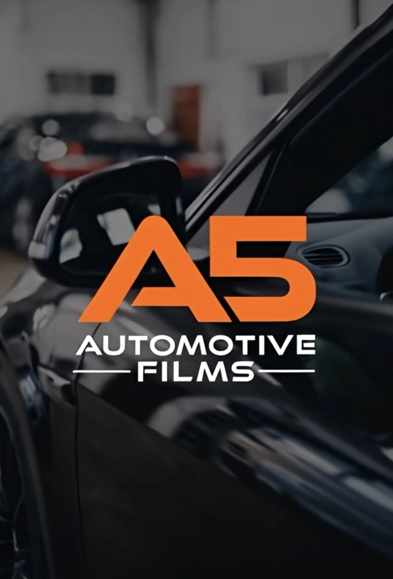 Close-up of a car door and side mirror inside a garage, overlaid with the logo for A5 Automotive Films in orange and white text.