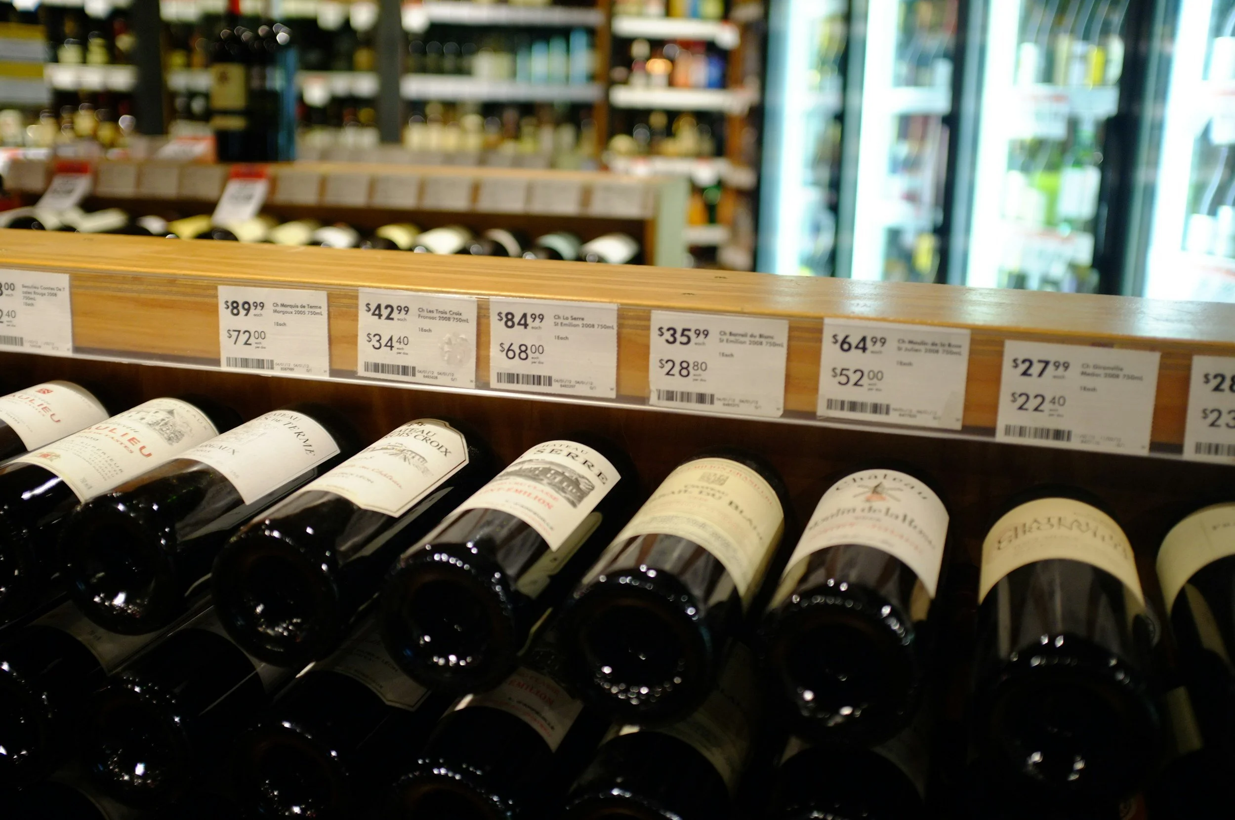 wine-store-shelf-prices-bottles-wine-selection.jpg