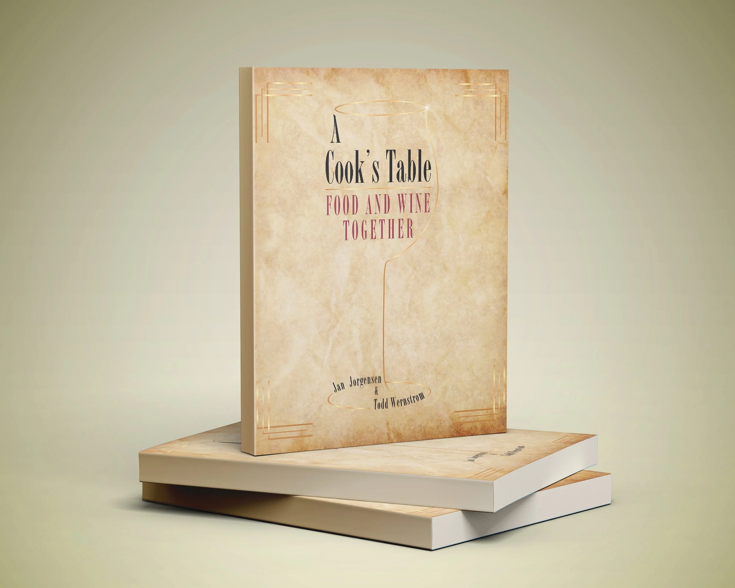 Mockup of “A Cook’s Table: Food and Wine Together” by Todd Wernstrom displayed on stacked books against a neutral background.