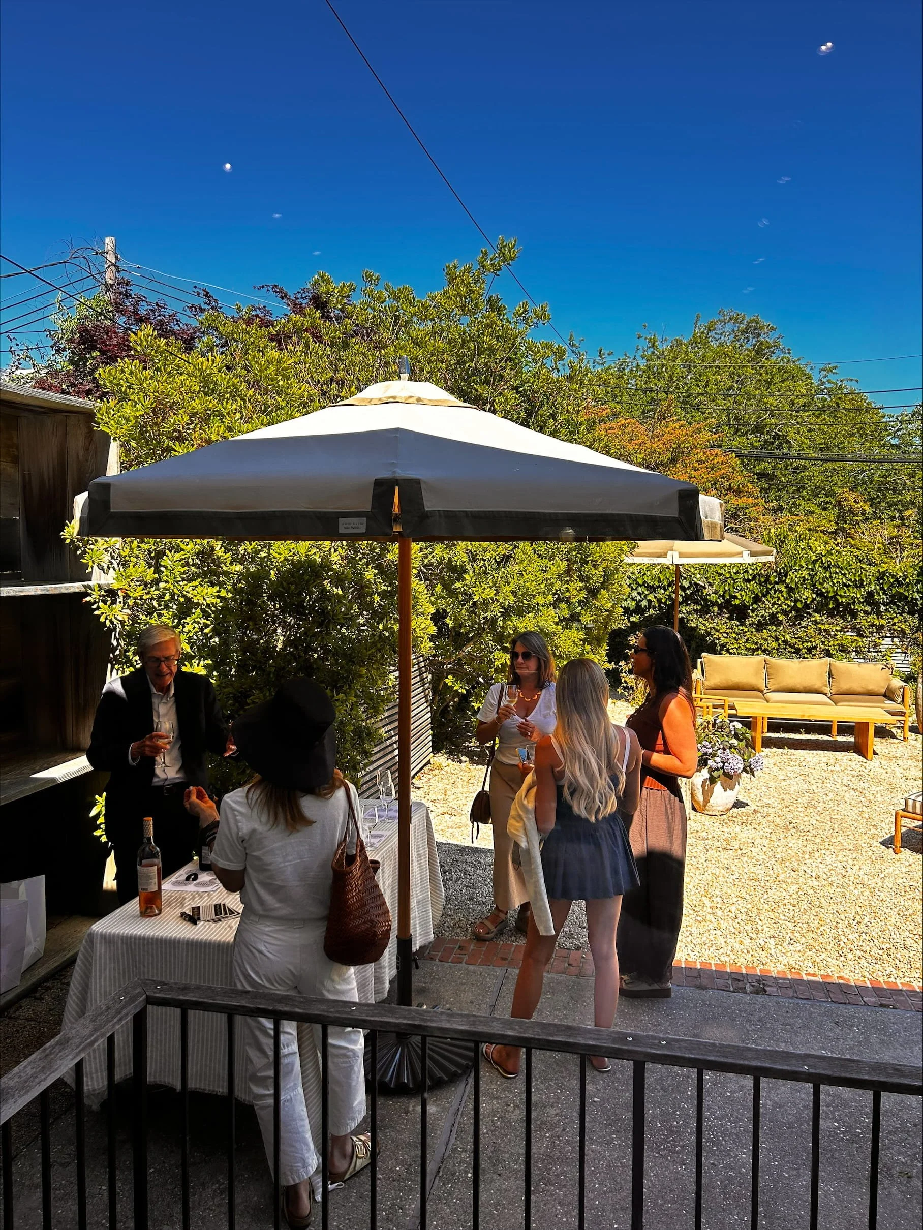 Guests gathered for a private wine tasting experience hosted by Urban Pour Tastings during the Jenni Kayne Southampton anniversary event.