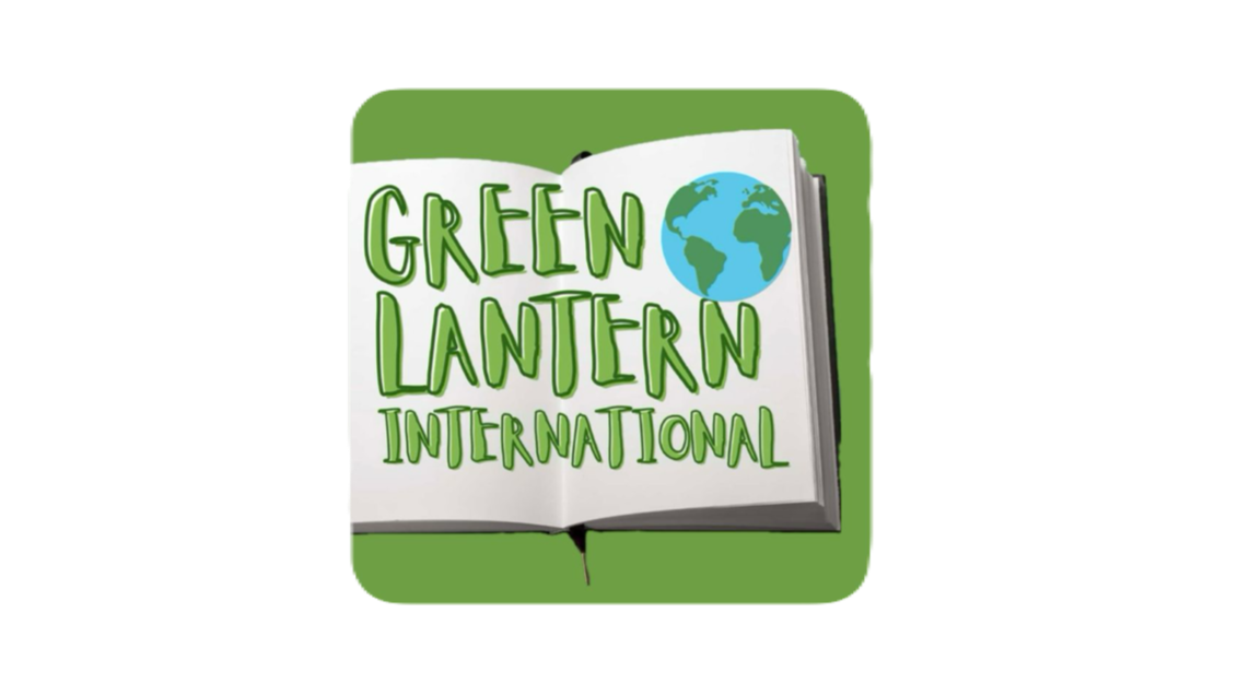 Illustration of an open book with green text that reads "Green Lantern International" and a globe icon on the right page, set against a green background.