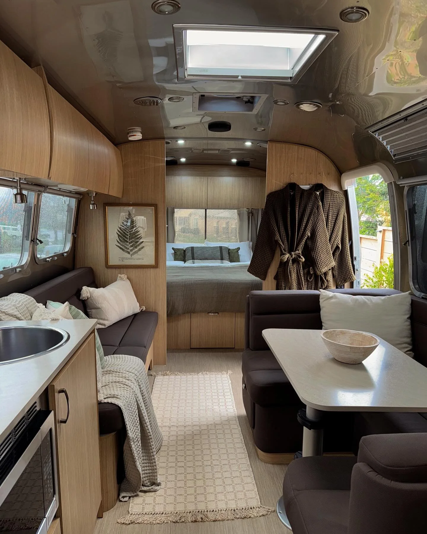 Serenity 🌱 Where would you travel to in this @airstream_inc?