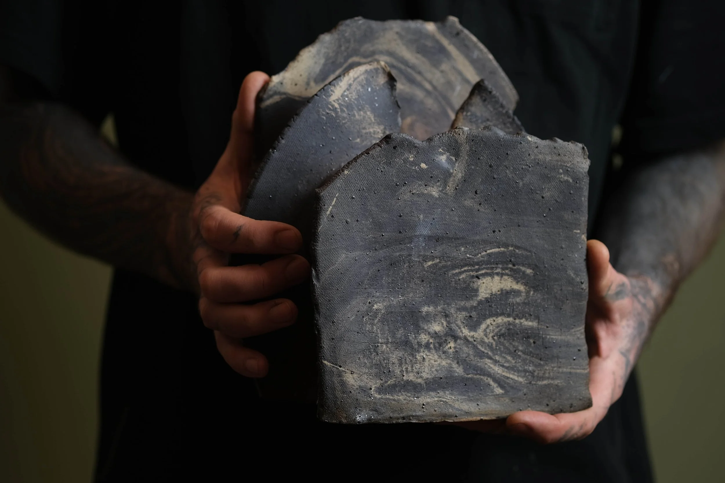 Mountain Vessel handmade ceramic sculpture featuring a dark sculptural clay form with layered slab construction, contemporary ceramic art by London artist