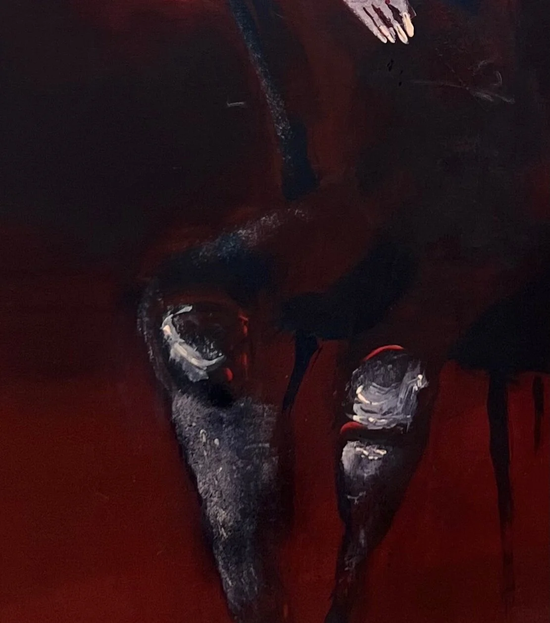 Close-up of Social Creature painting highlighting textured brushwork and dramatic red and black composition