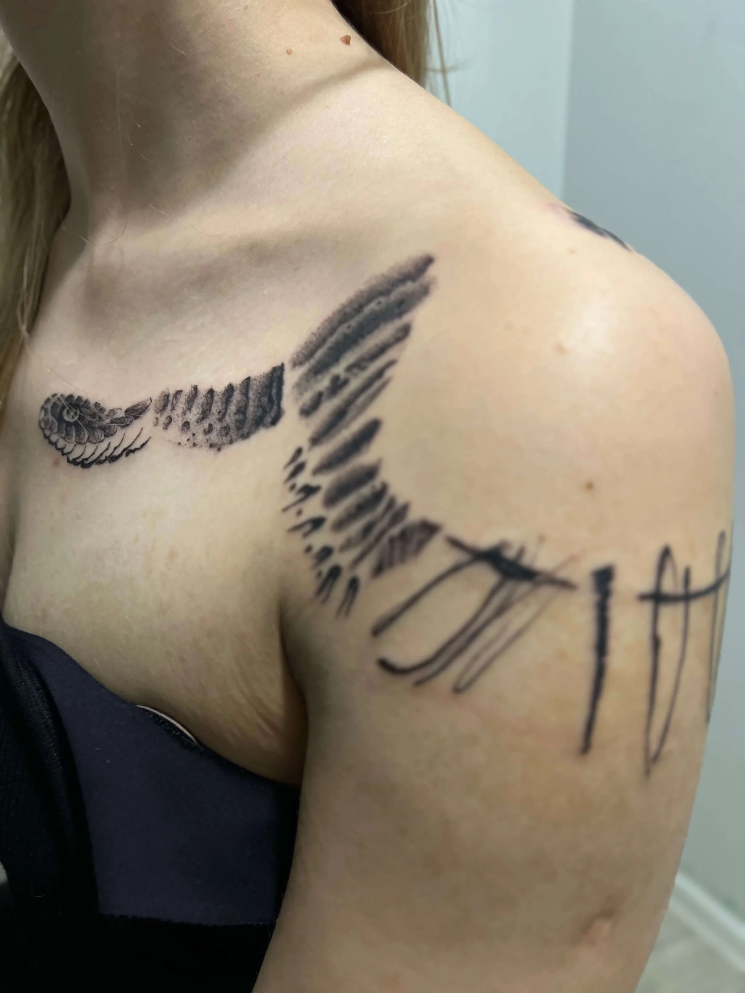 Contemporary blackwork snake design integrated into organic abstract linework.