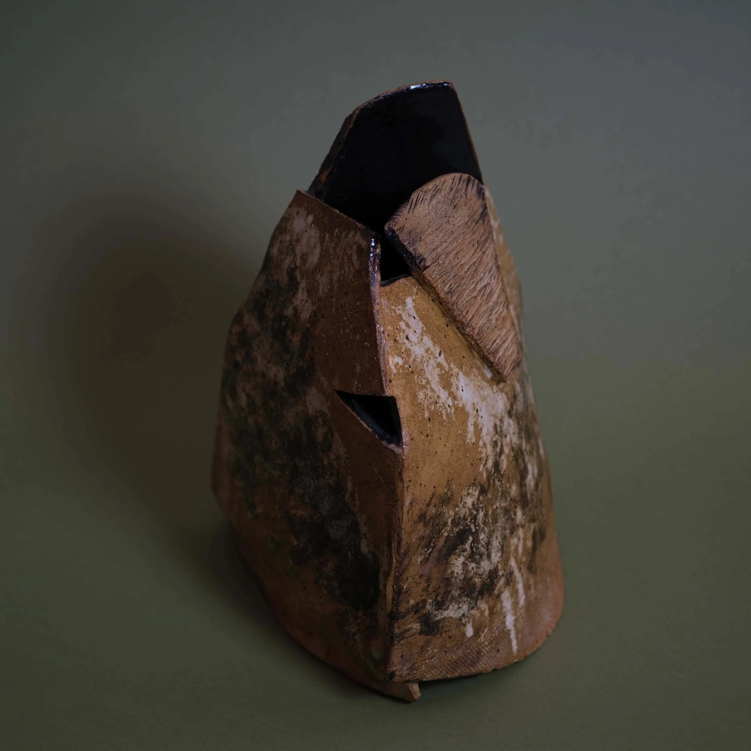 Drifted Shape handmade ceramic artwork with weathered clay texture and bold sculptural structure