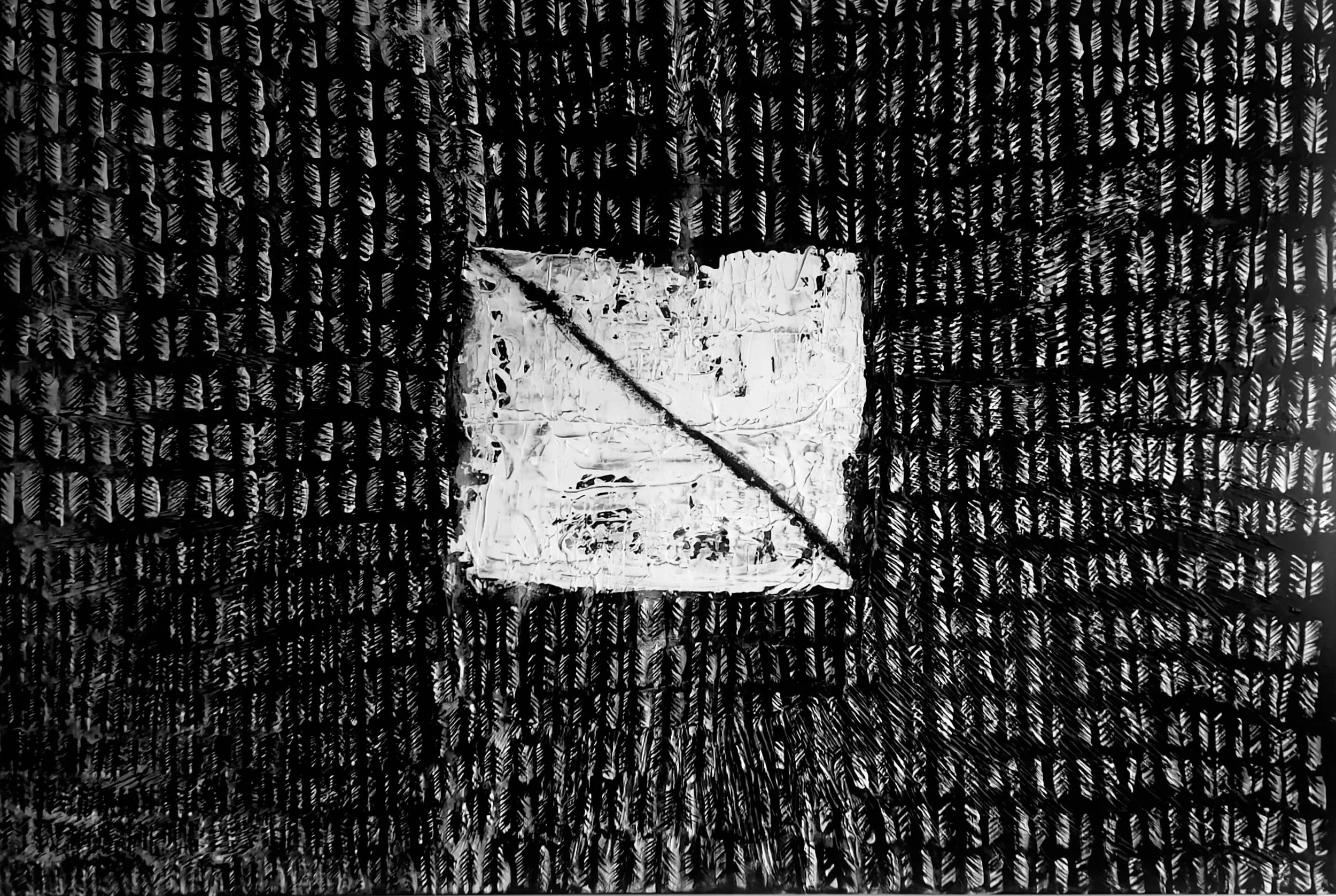 Stillness contemporary abstract painting featuring a textured black grid surface with a contrasting white geometric form, original artwork by London artist