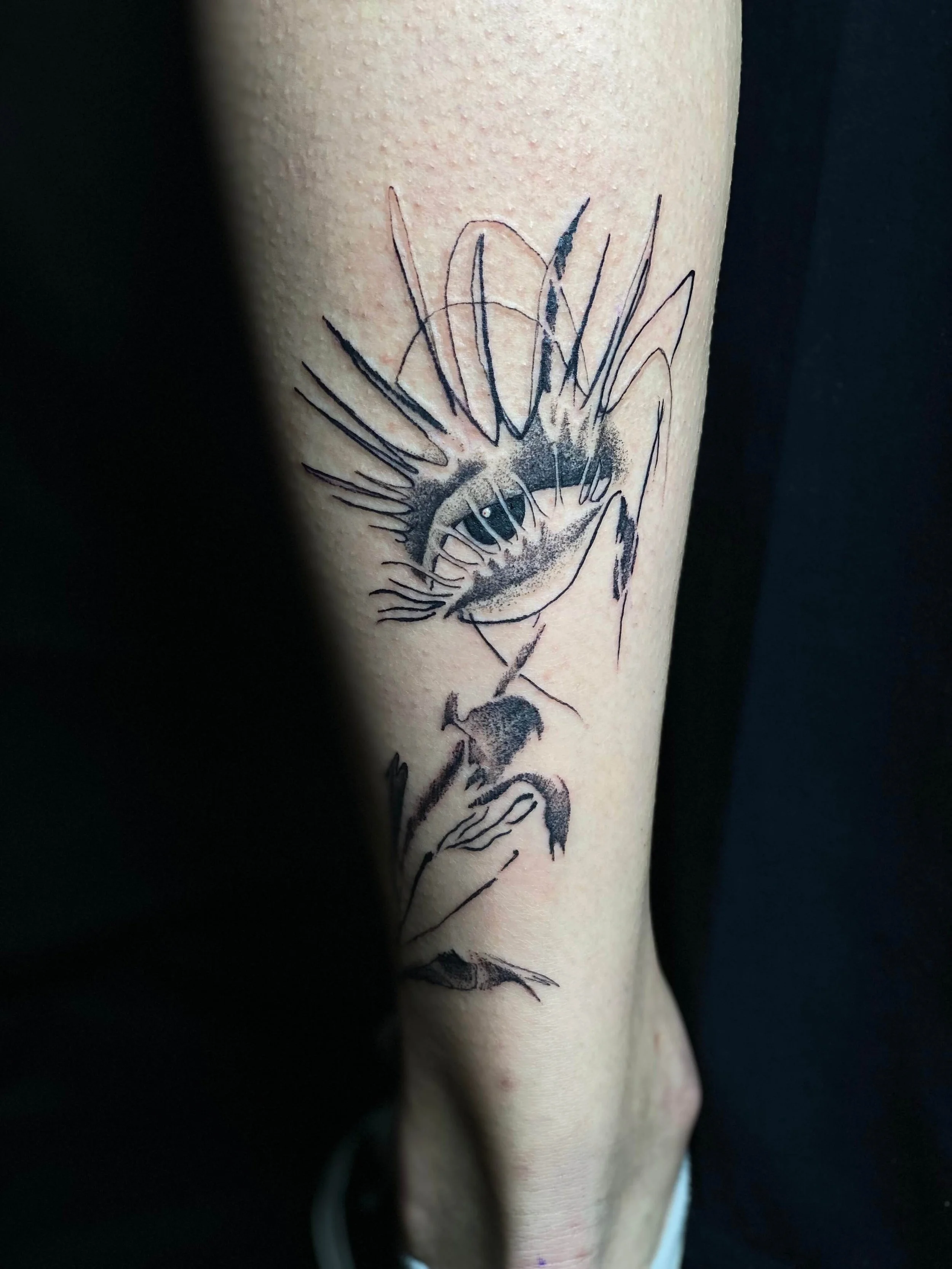 Abstract venus fly trap tattoo with expressive black ink linework.