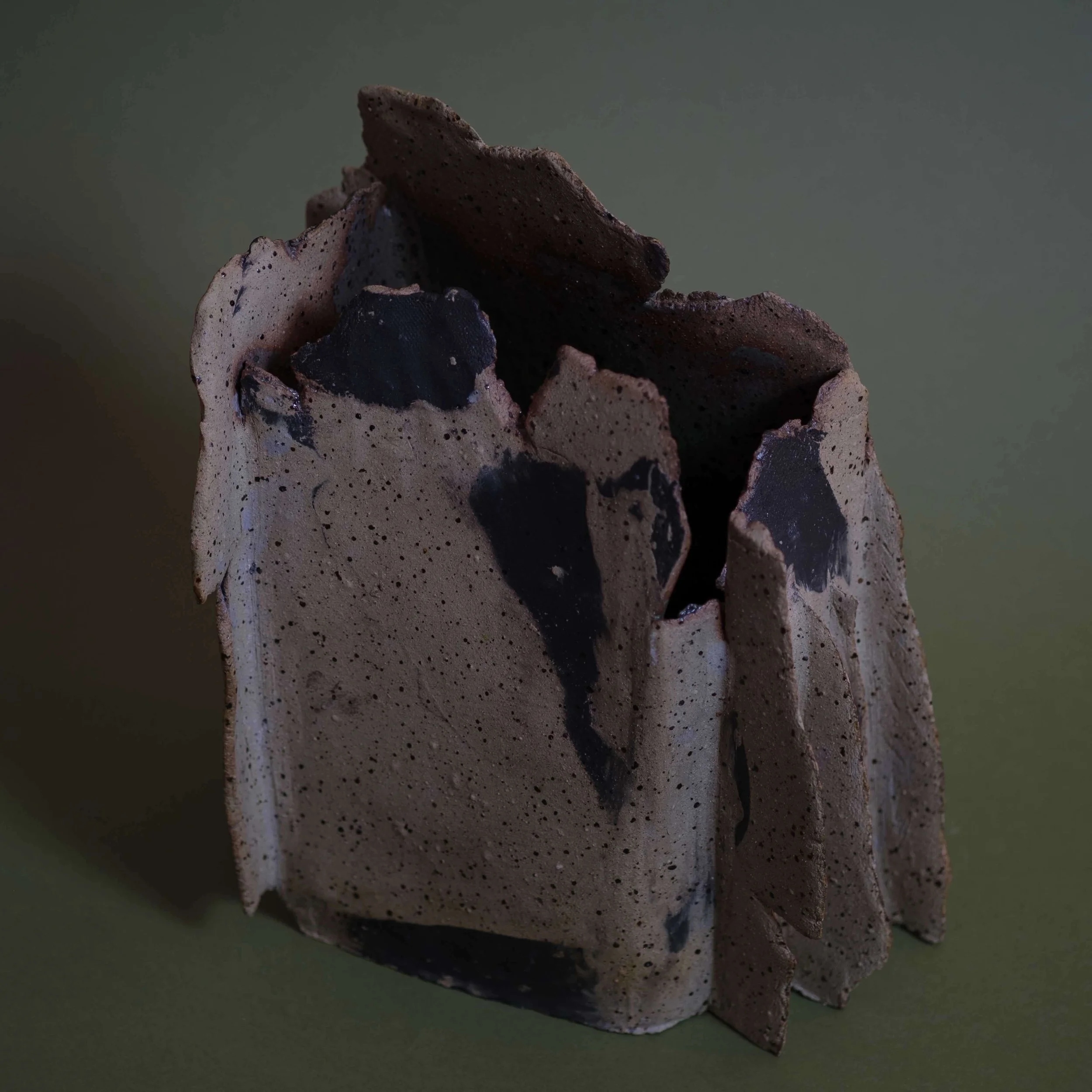 Detail of Mountain Vessel II handmade ceramic art highlighting textured clay surface and earthy glaze variations