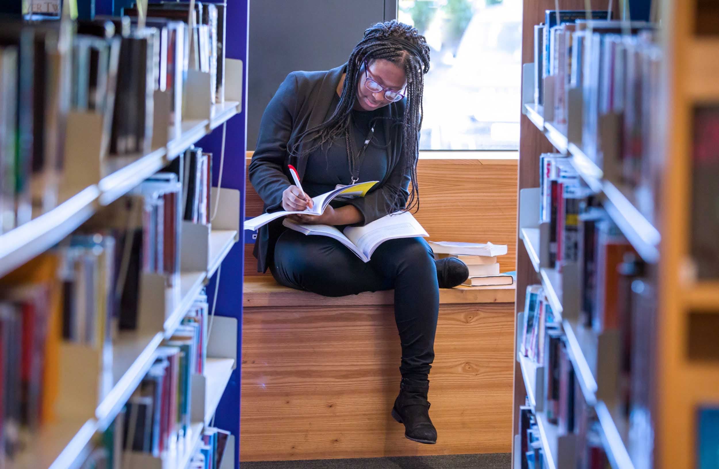 secondary-school-girl-studying-library.jpg