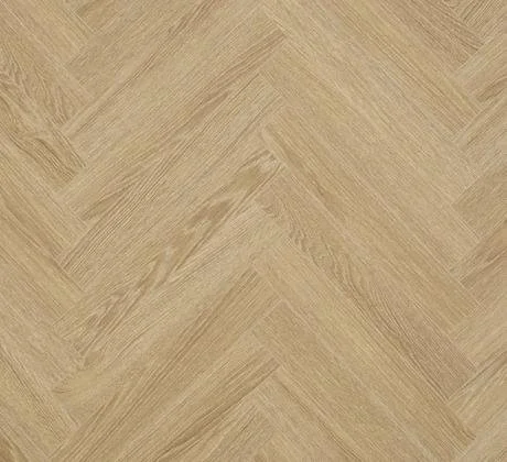 Close-up of a wooden parquet floor with a herringbone pattern.