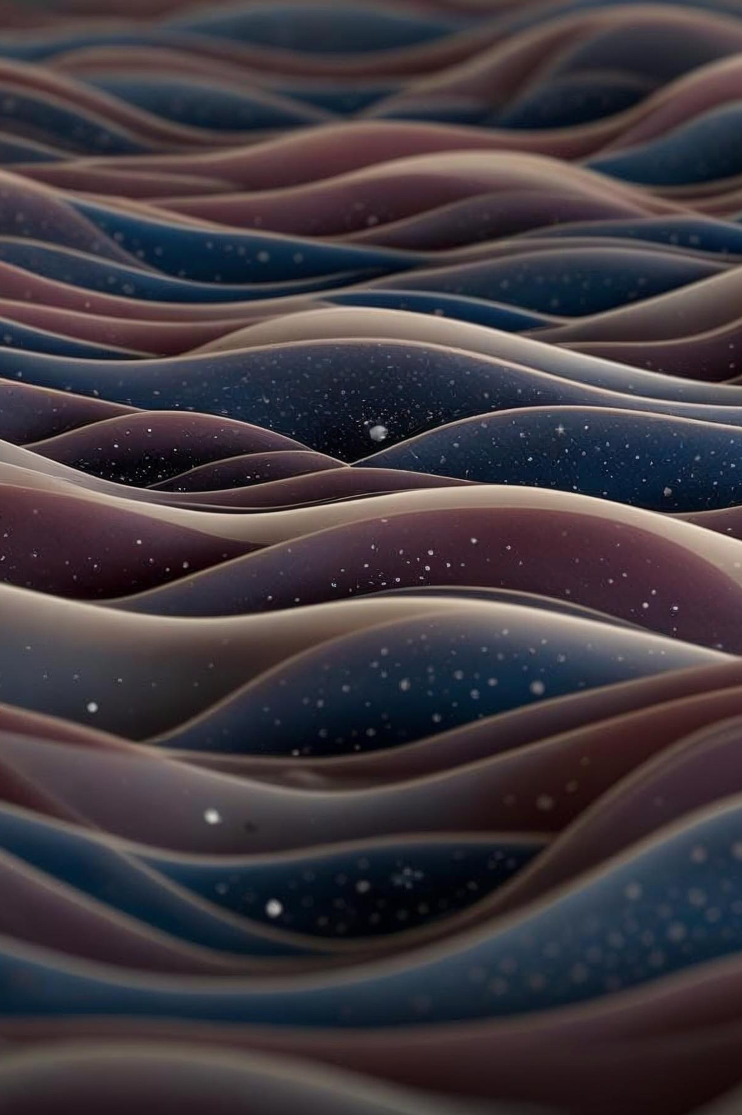Close-up of multicolored twisted glass or plastic strands with a starry or speckled pattern