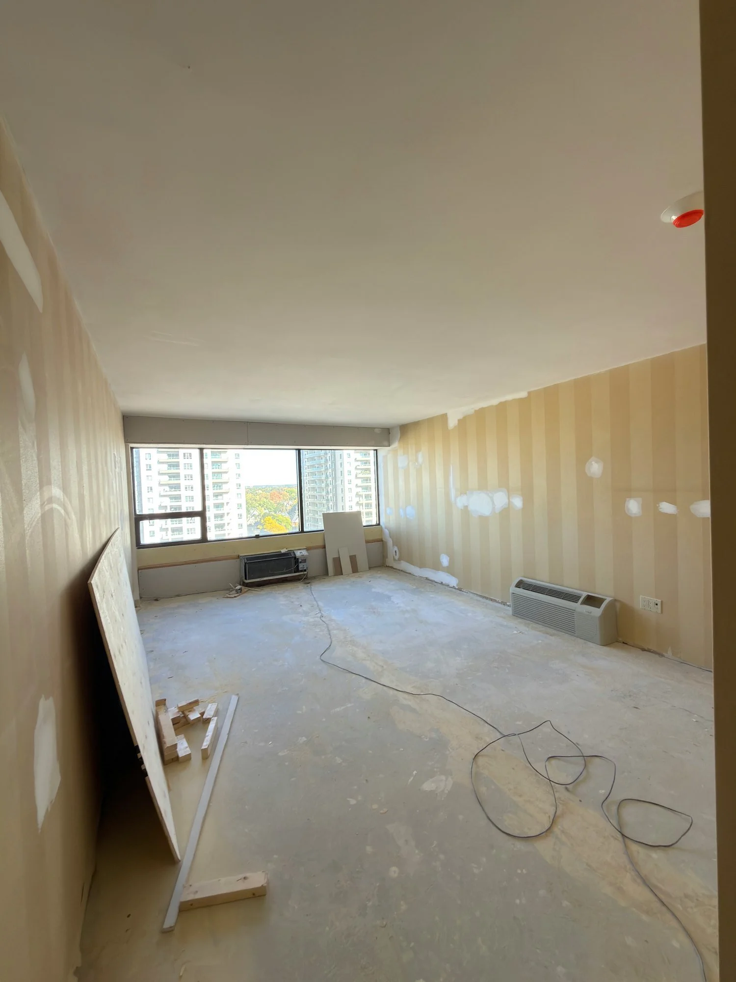 apartment-room-drywall-sheet-leaning-in-progress-london-ontario-01.jpg
