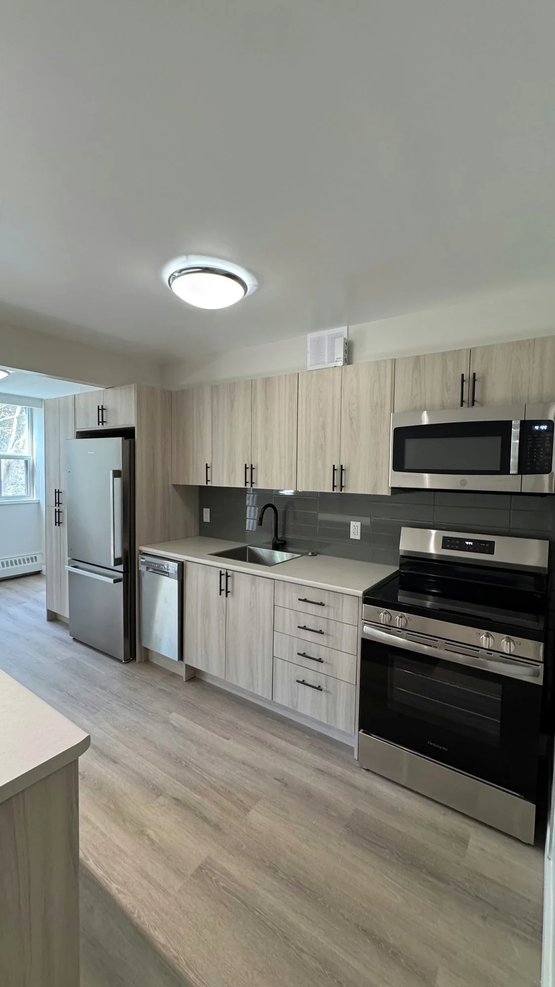 new-kitchen-cabinets-range-microwave-finished-london-ontario-01.jpg