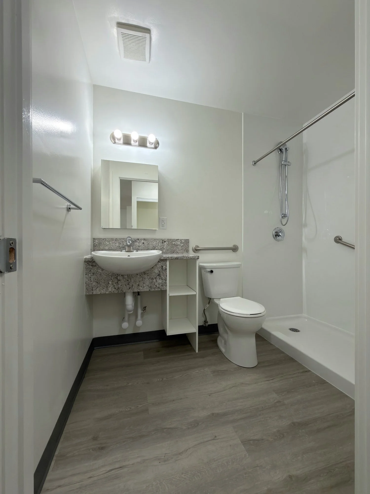 accessible-bathroom-wall-hung-sink-low-shower-london-ontario-01.jpg