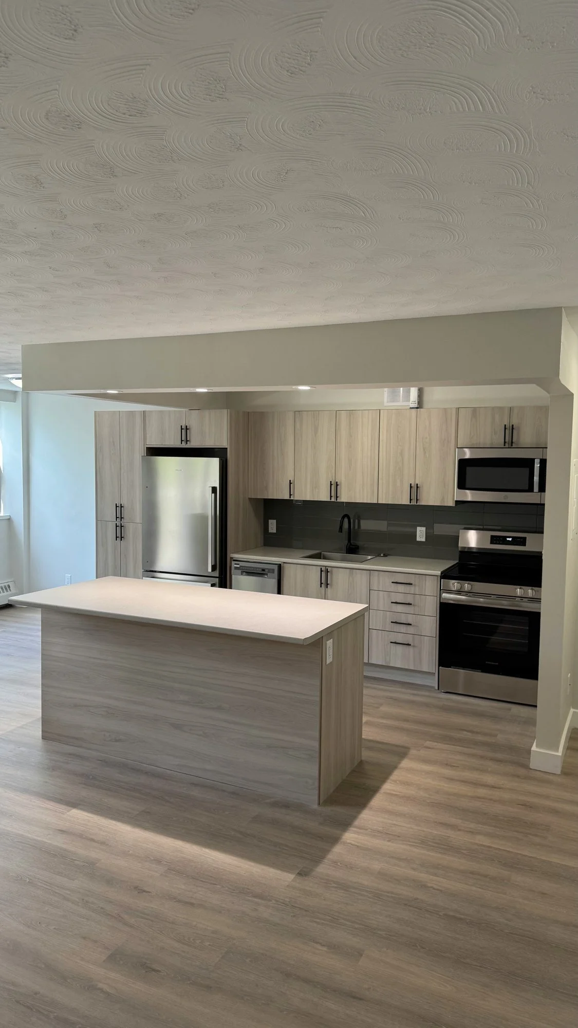 renovated-kitchen-island-stove-microwave-london-ontario-01.jpg
