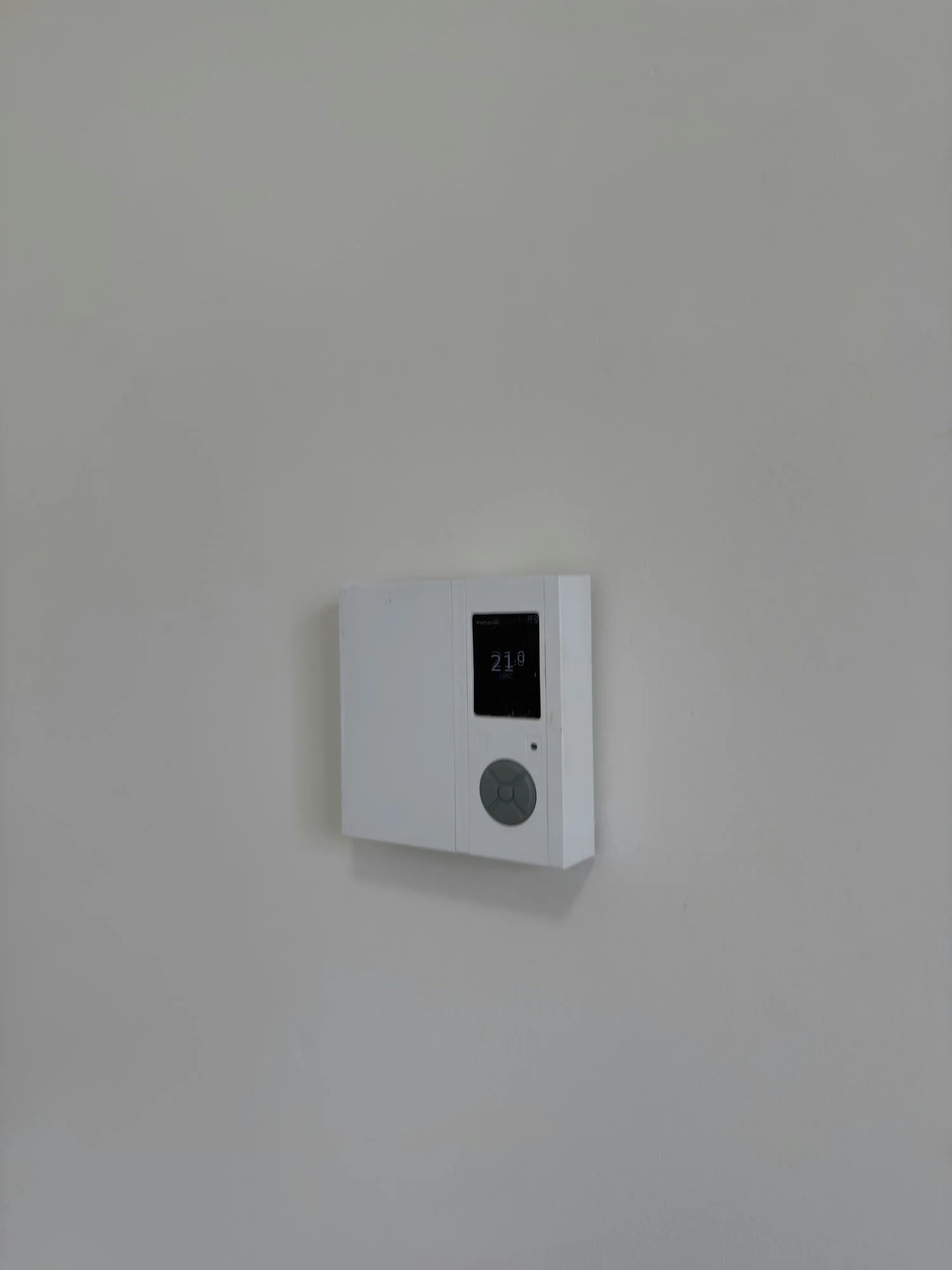 wall-mounted-digital-thermostat-apartment-unit-london-ontario-01.jpg