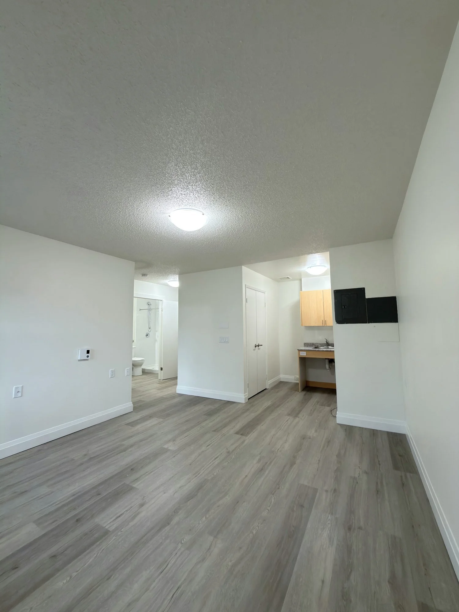finished-unit-toward-kitchenette-new-floor-london-ontario-01.jpg
