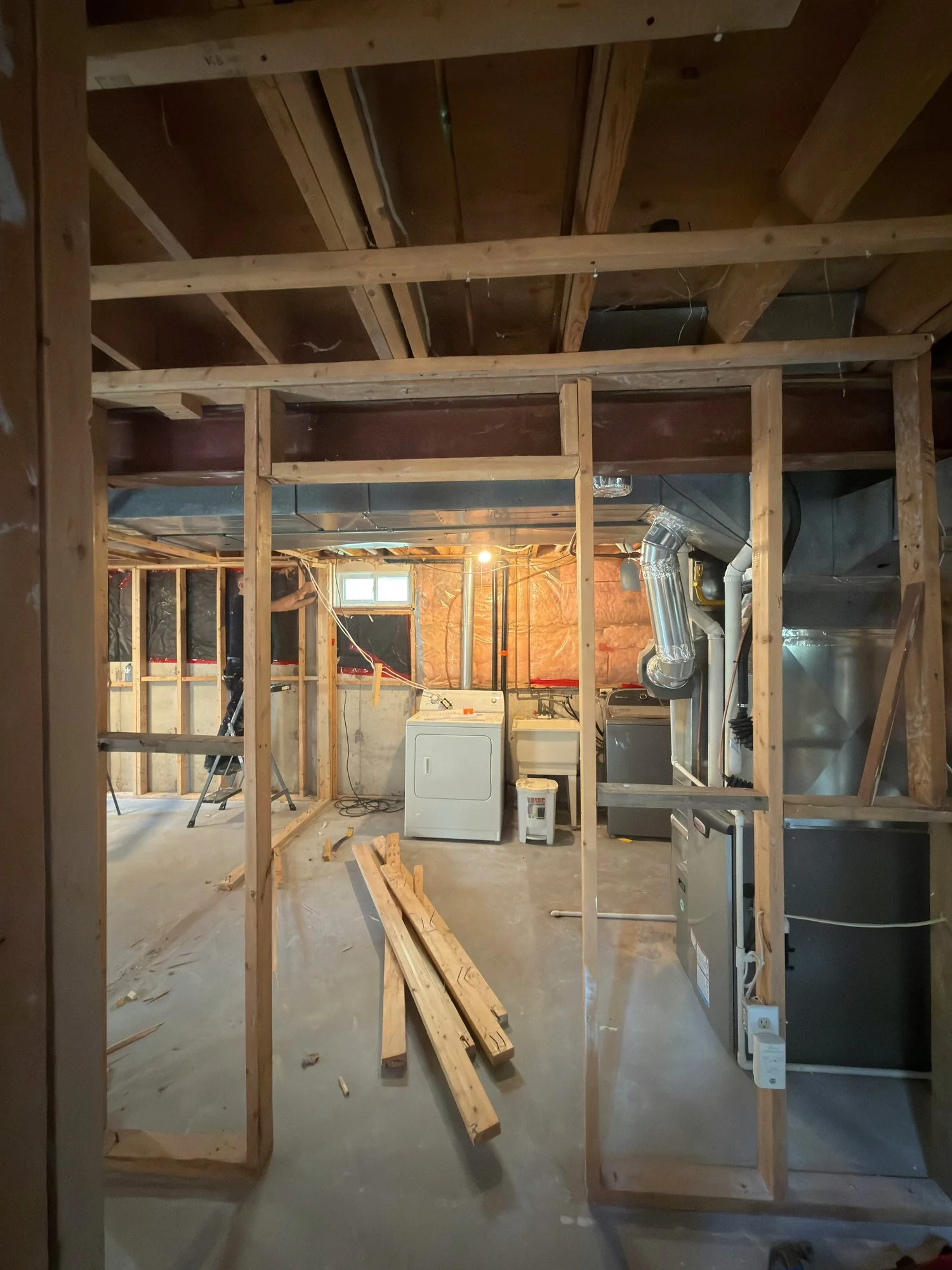 basement-stud-framing-lumber-on-floor-london-ontario-01.jpg