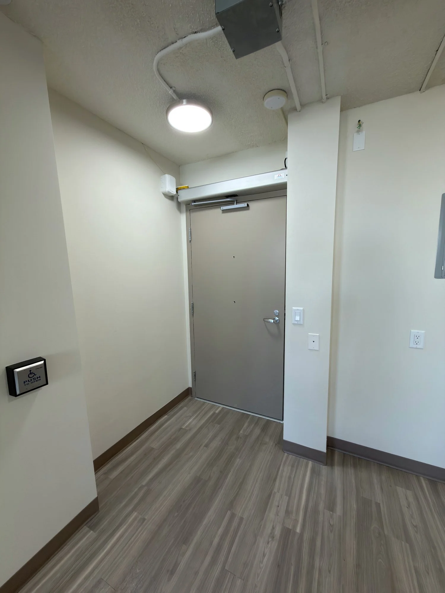 accessible-apartment-entry-door-automatic-opener-windsor-ontario-01.jpg