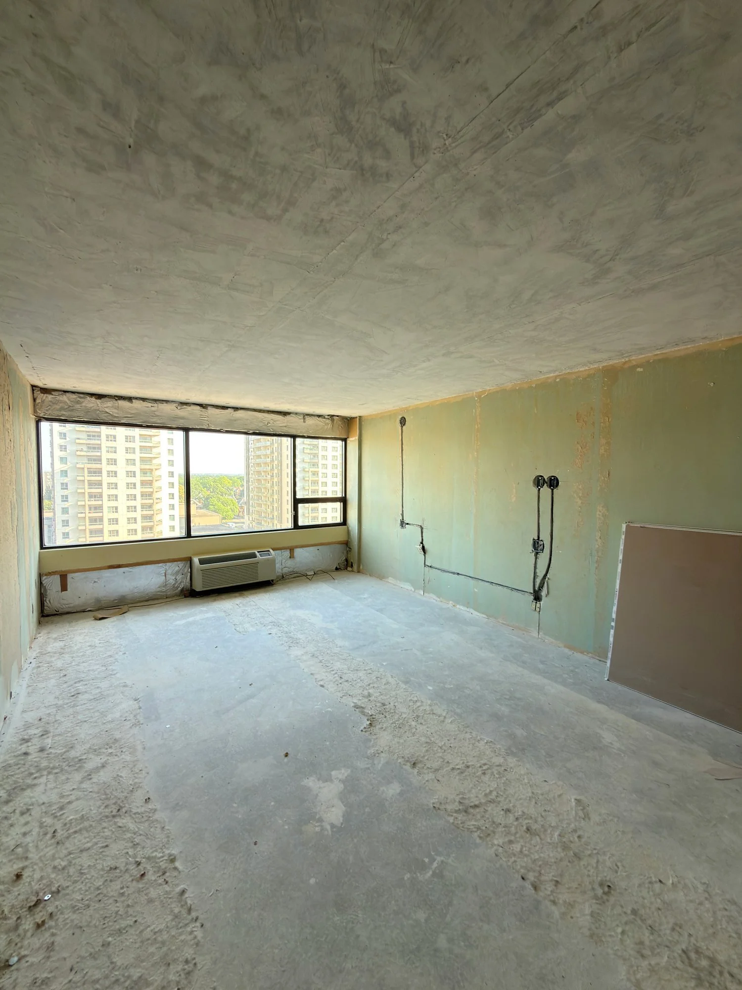 gutted-apartment-unit-bare-floor-london-ontario-01.jpg