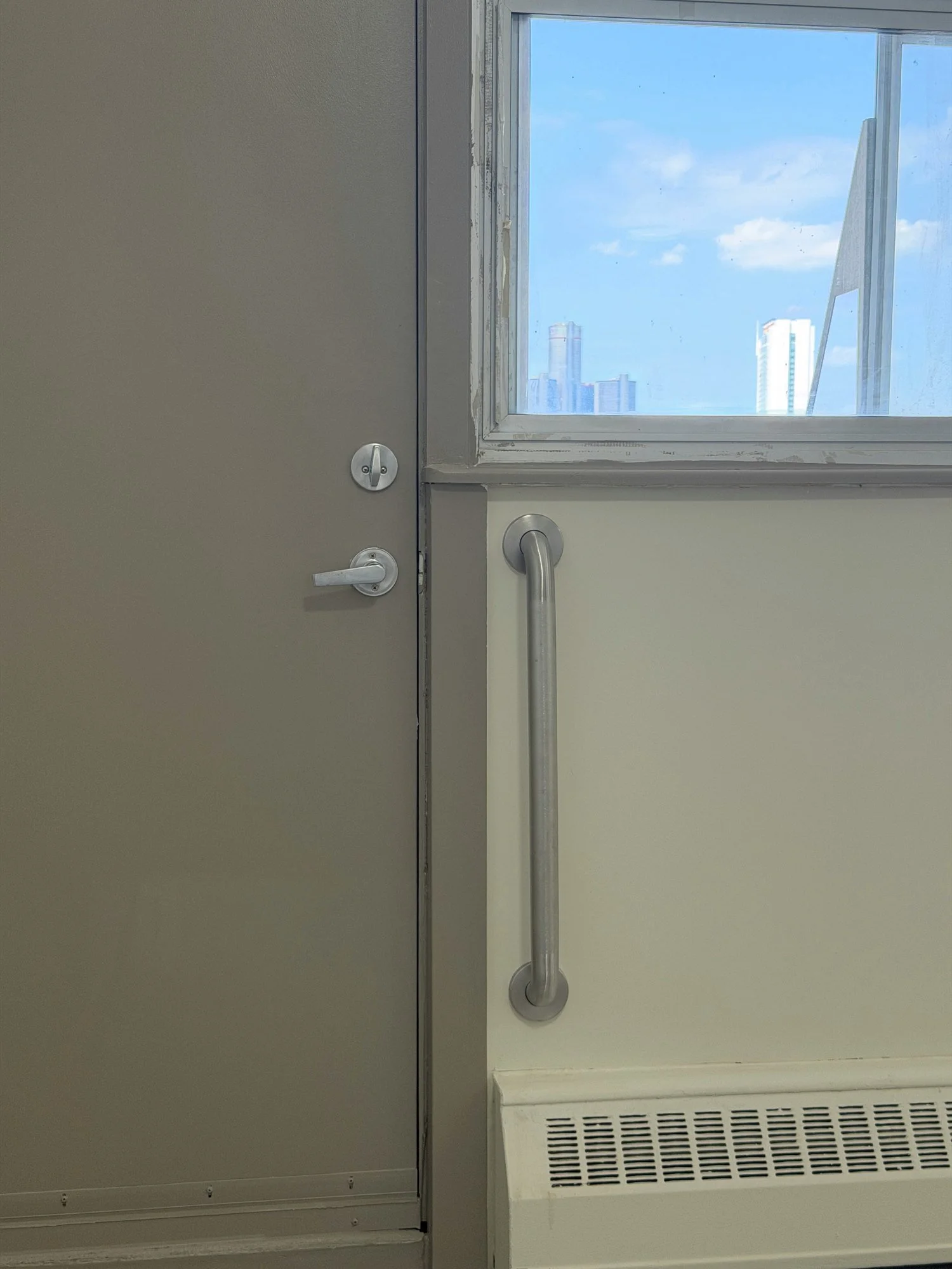 grab-bar-beside-door-finished-unit-windsor-ontario-01.jpg