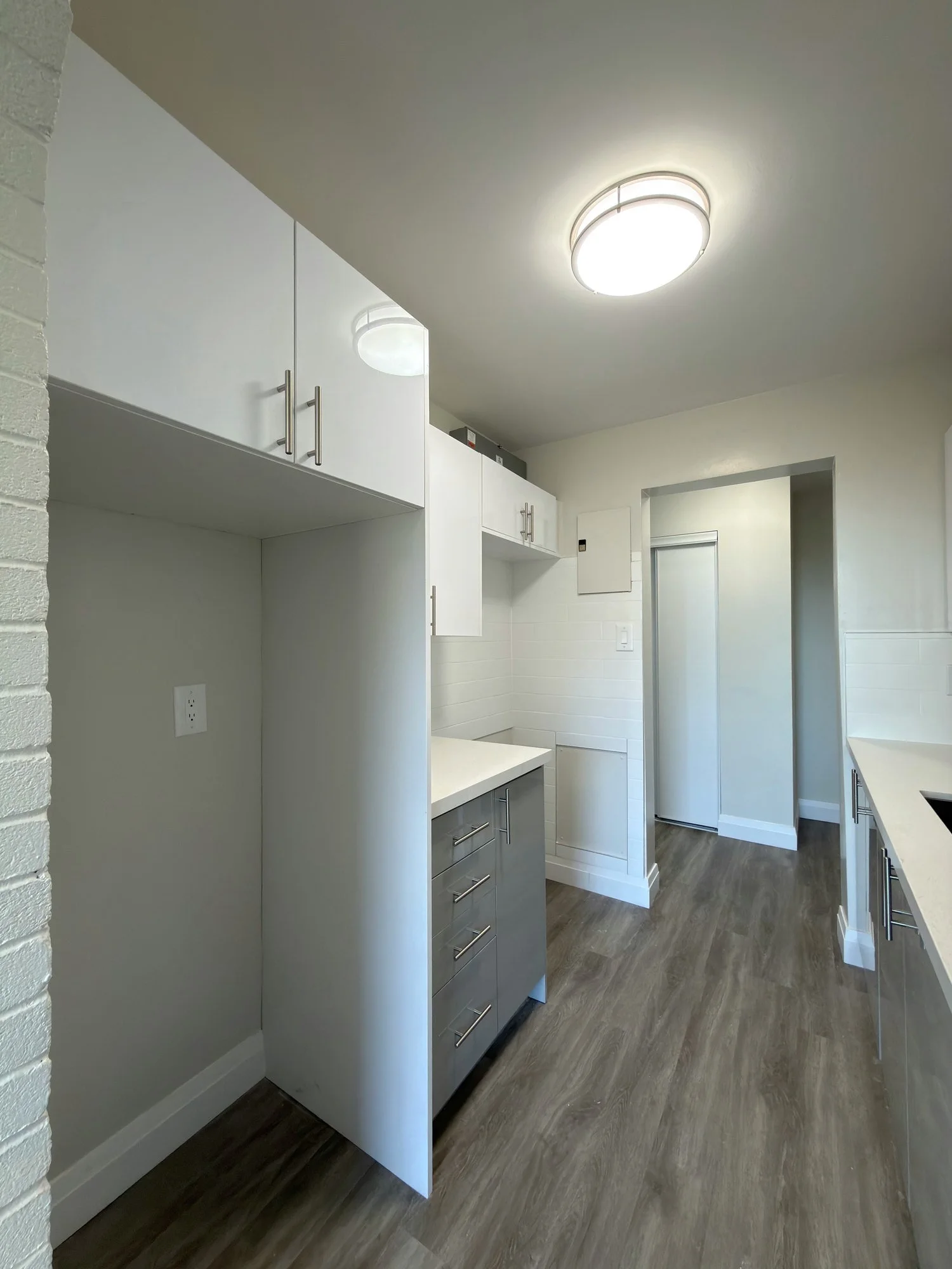 finished-kitchen-fridge-alcove-new-floor-london-ontario-01.jpg