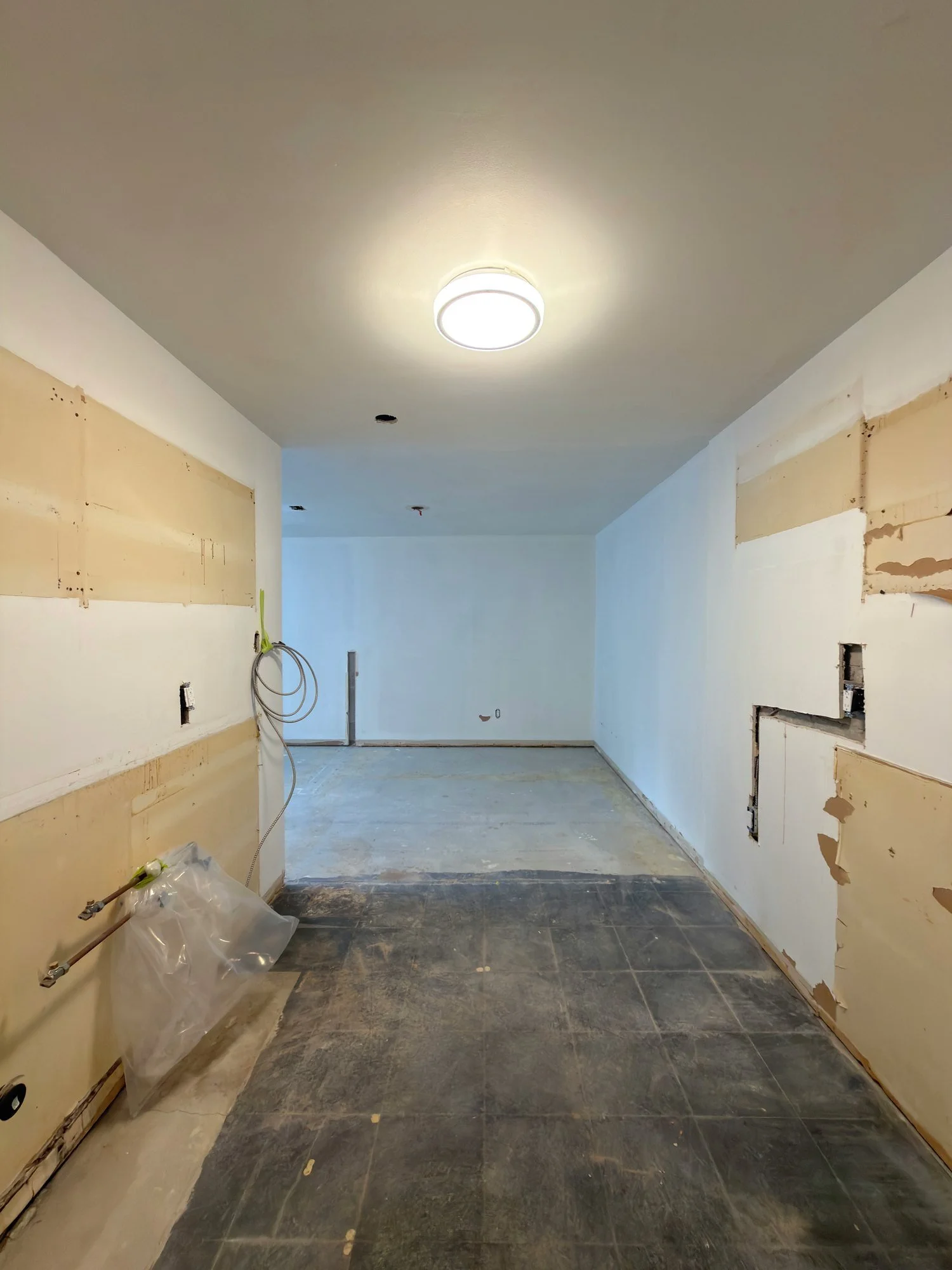 kitchen-demolition-cabinets-removed-bare-floor-tillsonburg-ontario-01.jpg