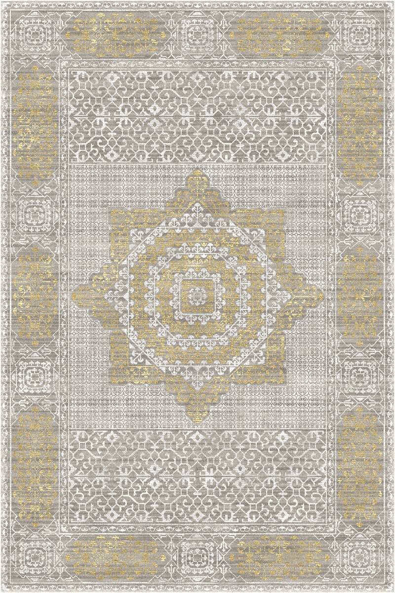 A decorative area rug with an intricate pattern in white, silver, and gold tones, featuring symmetrical geometric and floral motifs.
