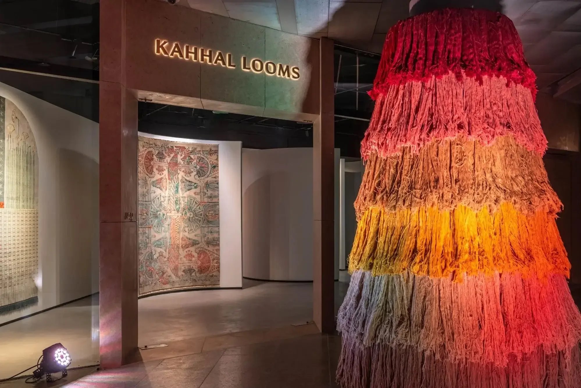 Interior view of Kahhal Looms gallery showcasing handmade Egyptian carpets