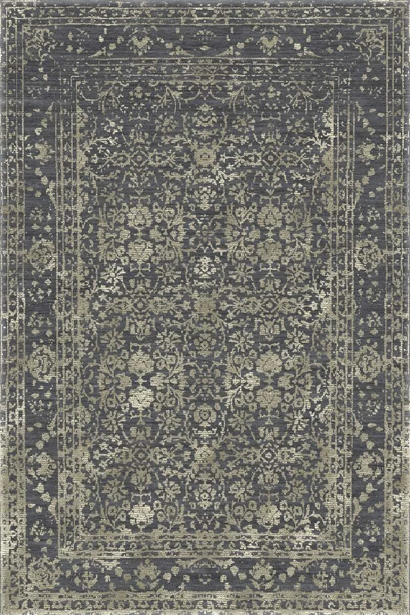 A vintage-style Persian rug with intricate floral and geometric patterns in shades of black, gray, and beige.