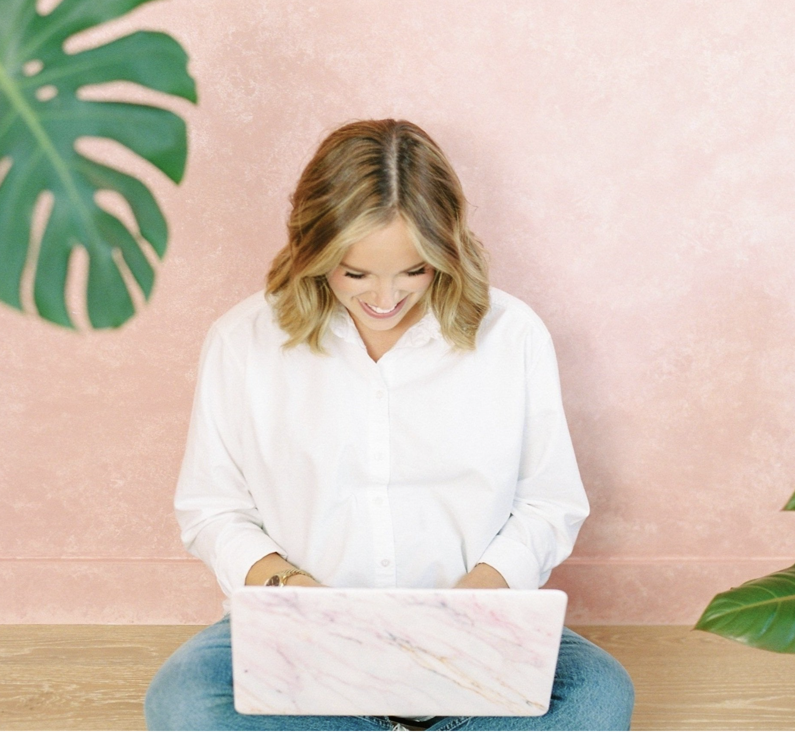 Mother of teen daughter looking at laptop and setting goals for new year