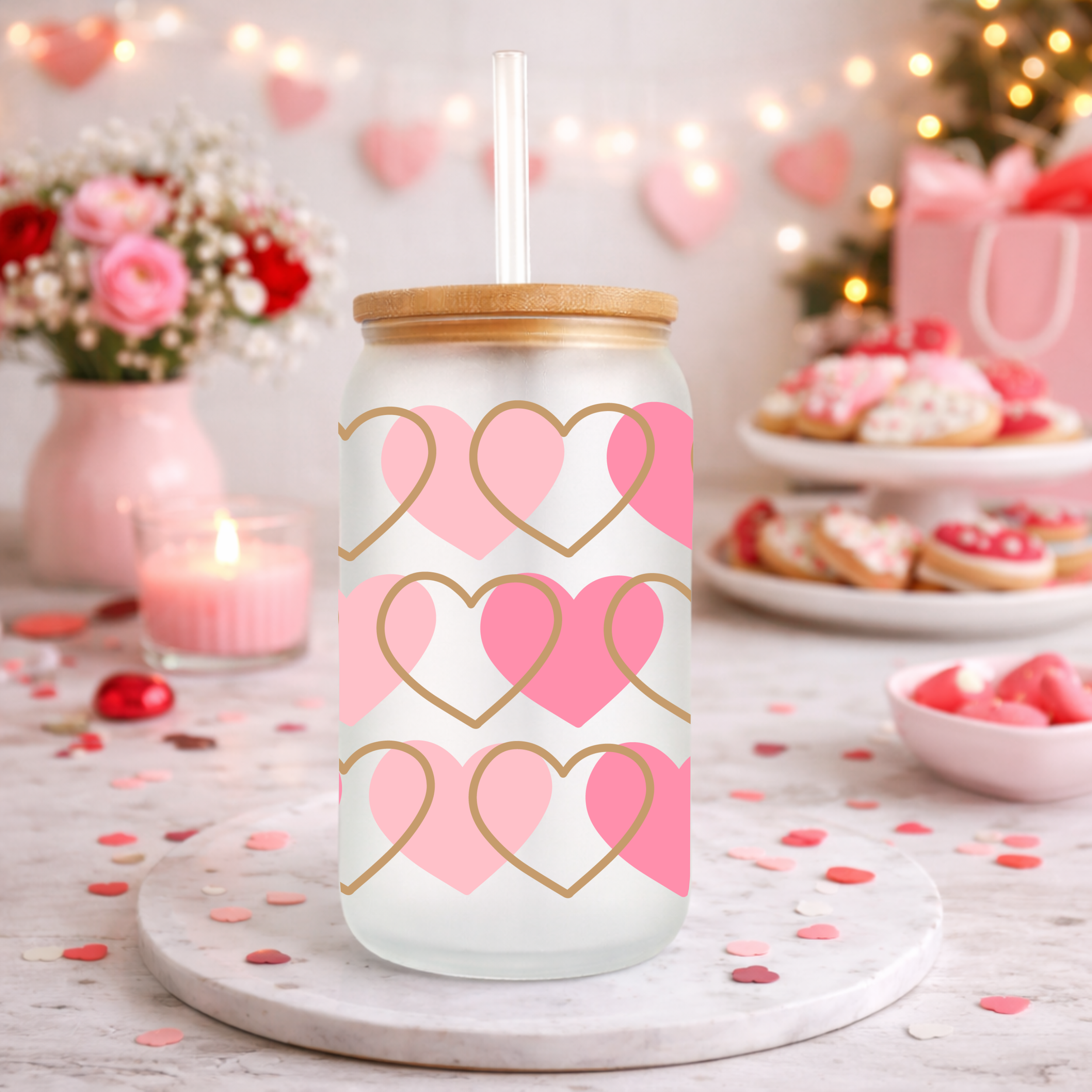 Photo 6 of a Valentine’s Day glass can with pink and gold hearts displayed on a marble pedestal with festive decor.