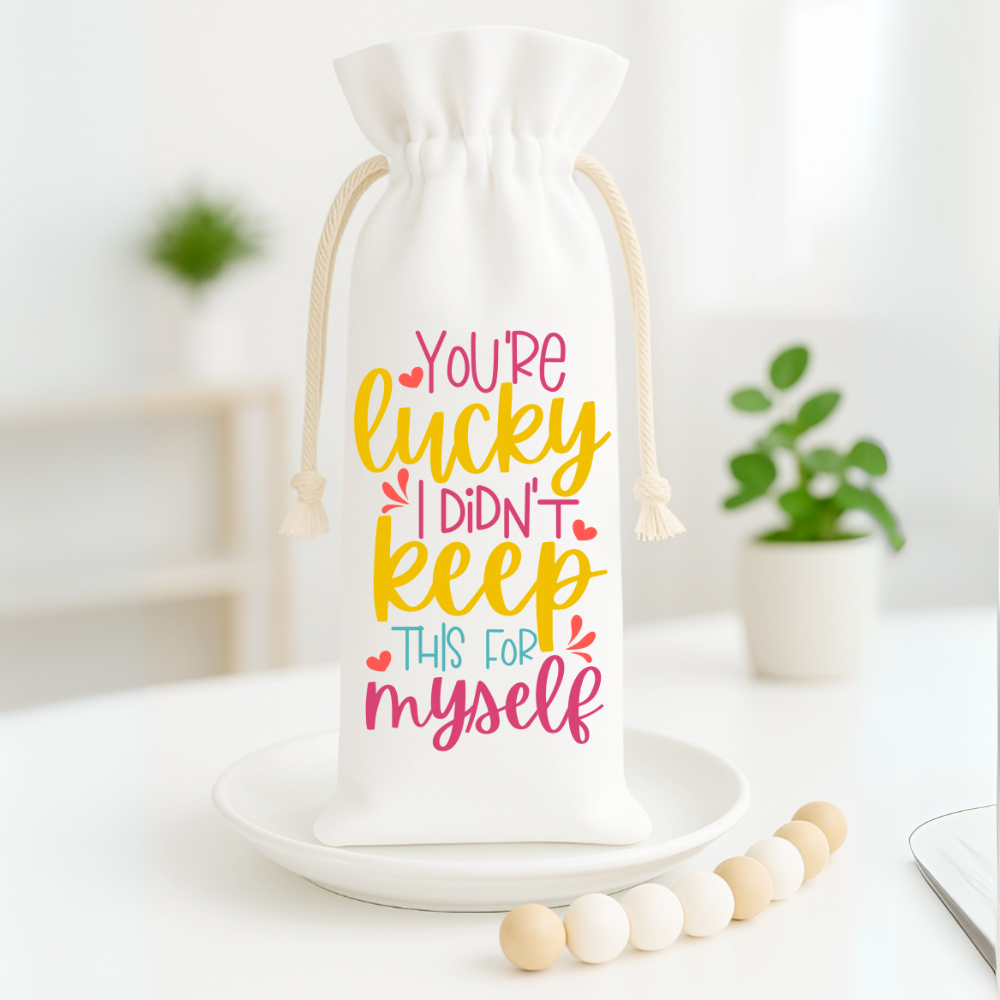 Colorful wine bottle gift bag with funny saying, reusable polyester bag ideal for birthday, holiday, or party gifts.