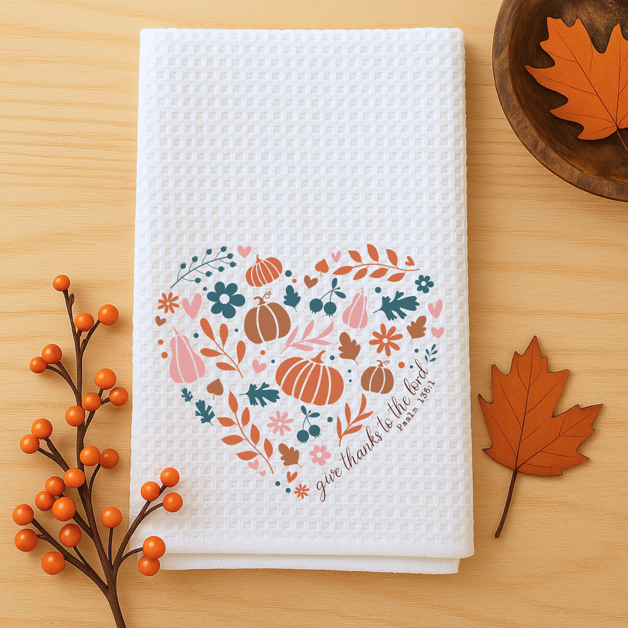 Give Thanks to the Lord waffle weave kitchen towel styled with autumn berries and rustic accents.