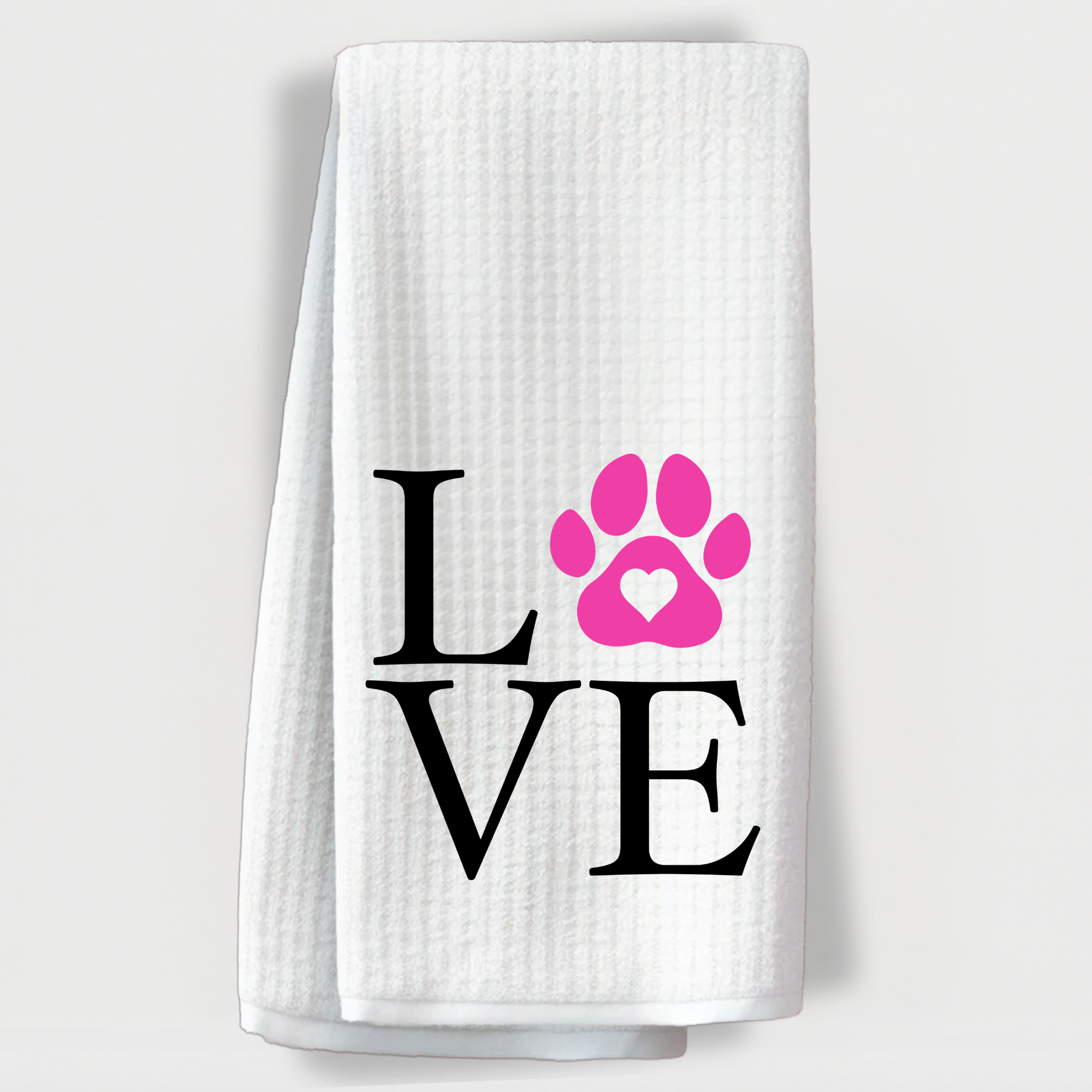 "Pet lover towel with the word LOVE in bold black font and a pink paw print for the O."