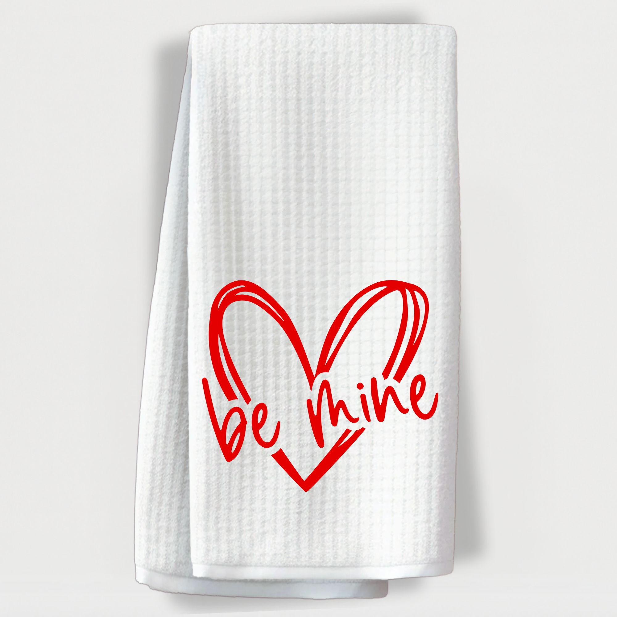 Romantic Valentine's Day towel with a bold red heart and 'be mine' message.