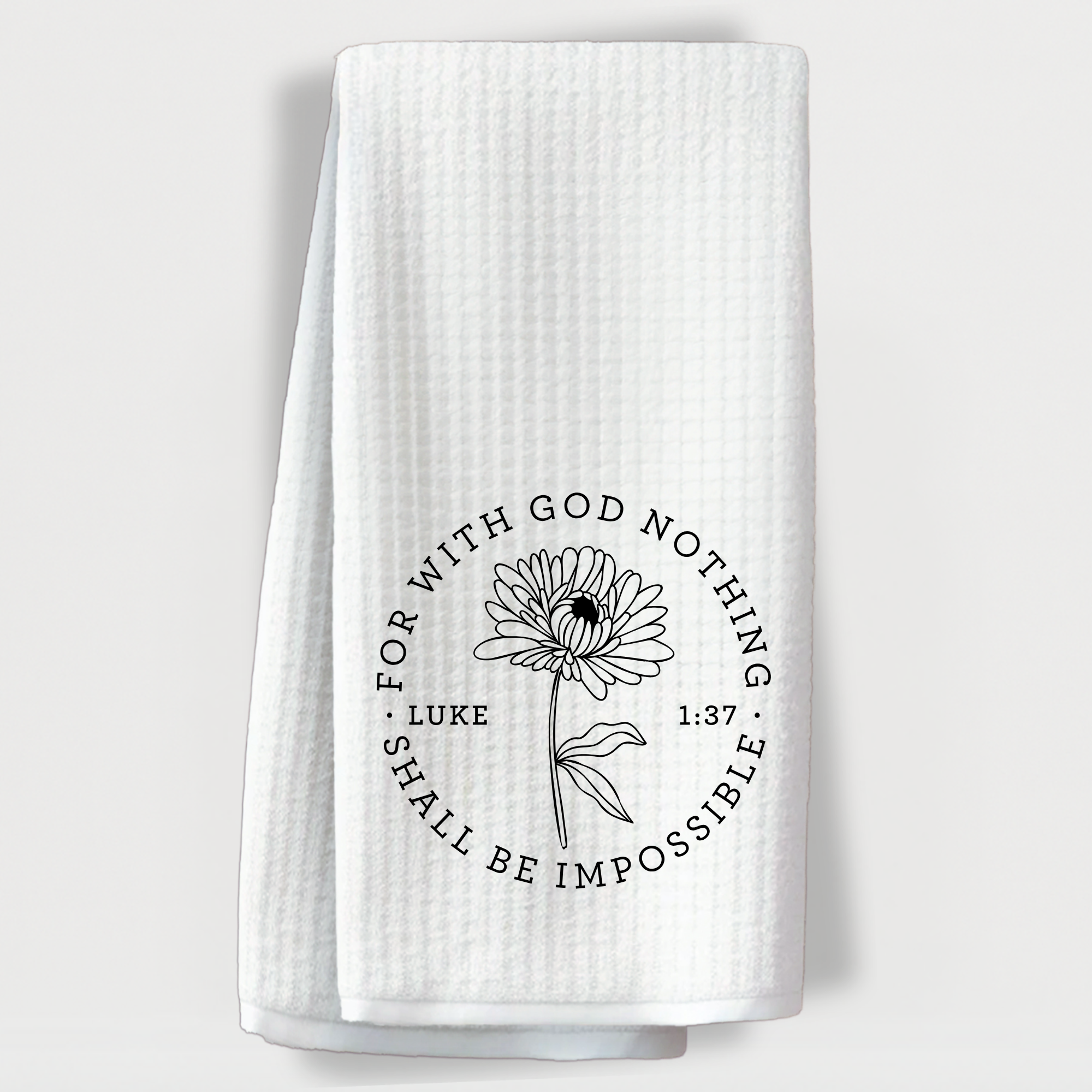 White waffle weave towel with inspirational Bible verse Luke 1:37.