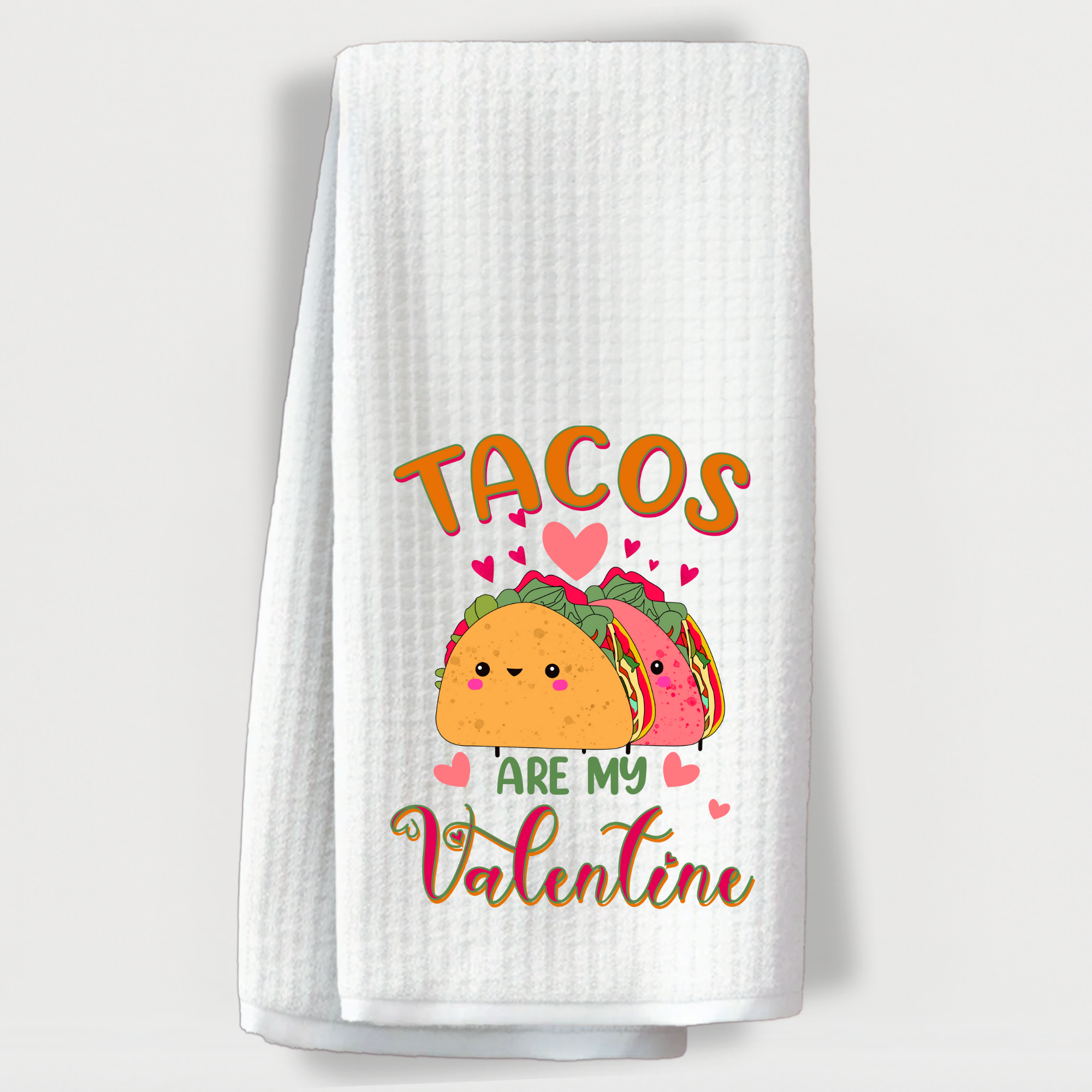 Cute taco-themed Valentine towel with hearts and the quote, “Tacos are my Valentine.”