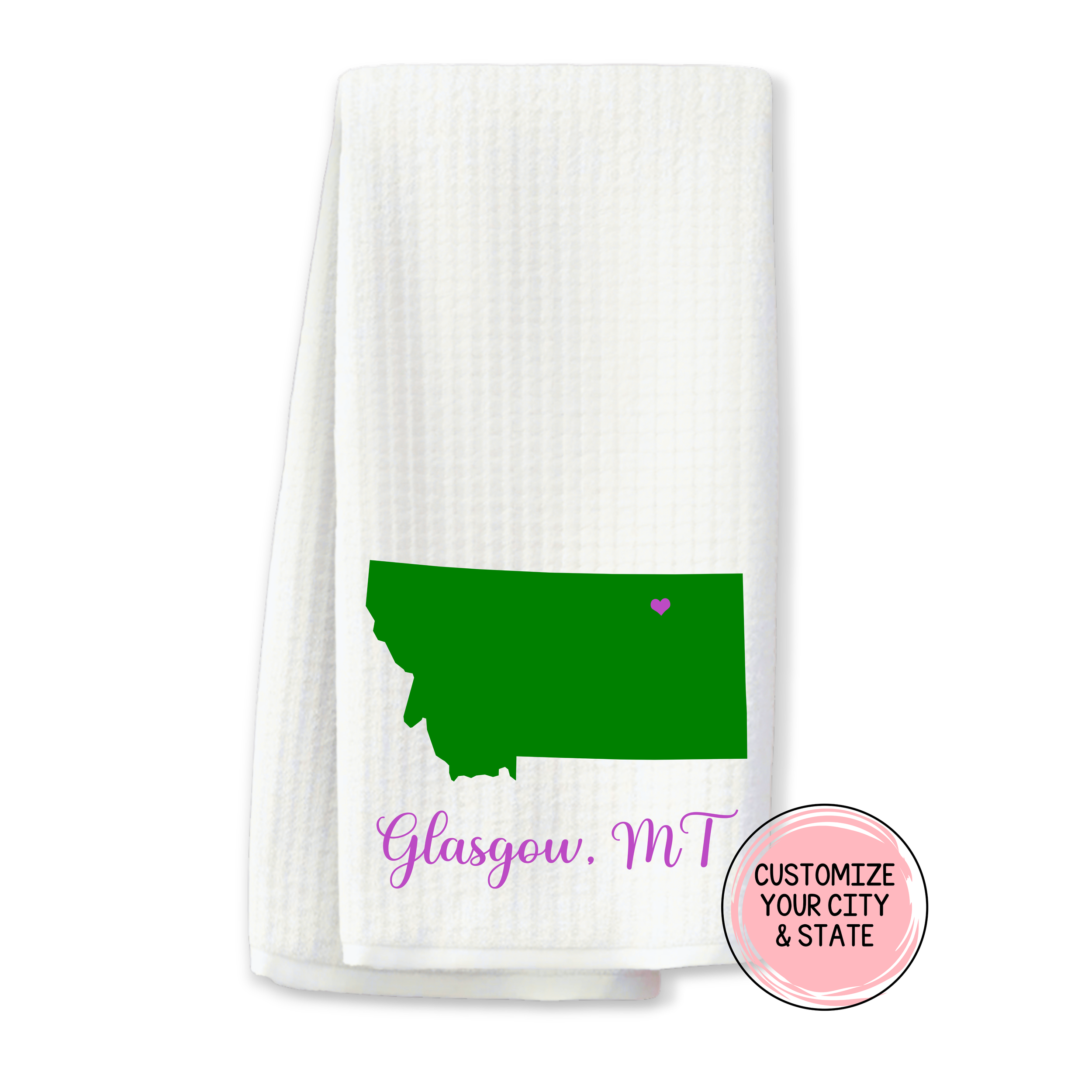 White waffle weave towel with green Montana silhouette and purple heart on Glasgow.