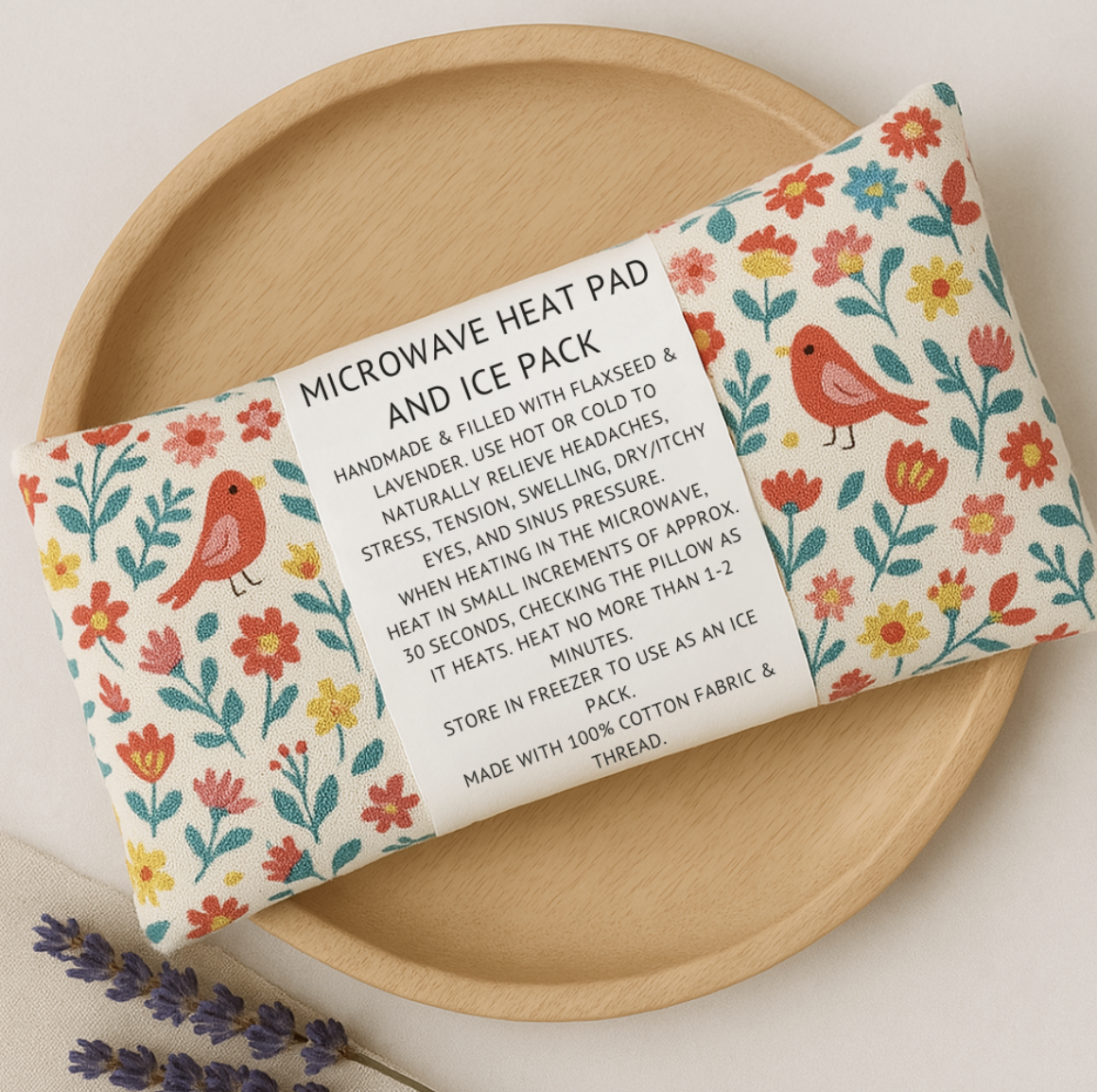 Cute bird and floral print flaxseed heat and ice pack with lavender, perfect for soothing tension and headaches.