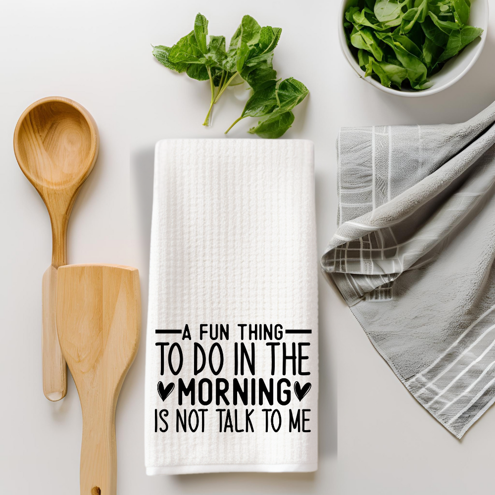 Premium waffle weave kitchen towel styled with wooden spoons and fresh herbs. Funny dish towel for modern farmhouse kitchens and sarcastic decor lovers.